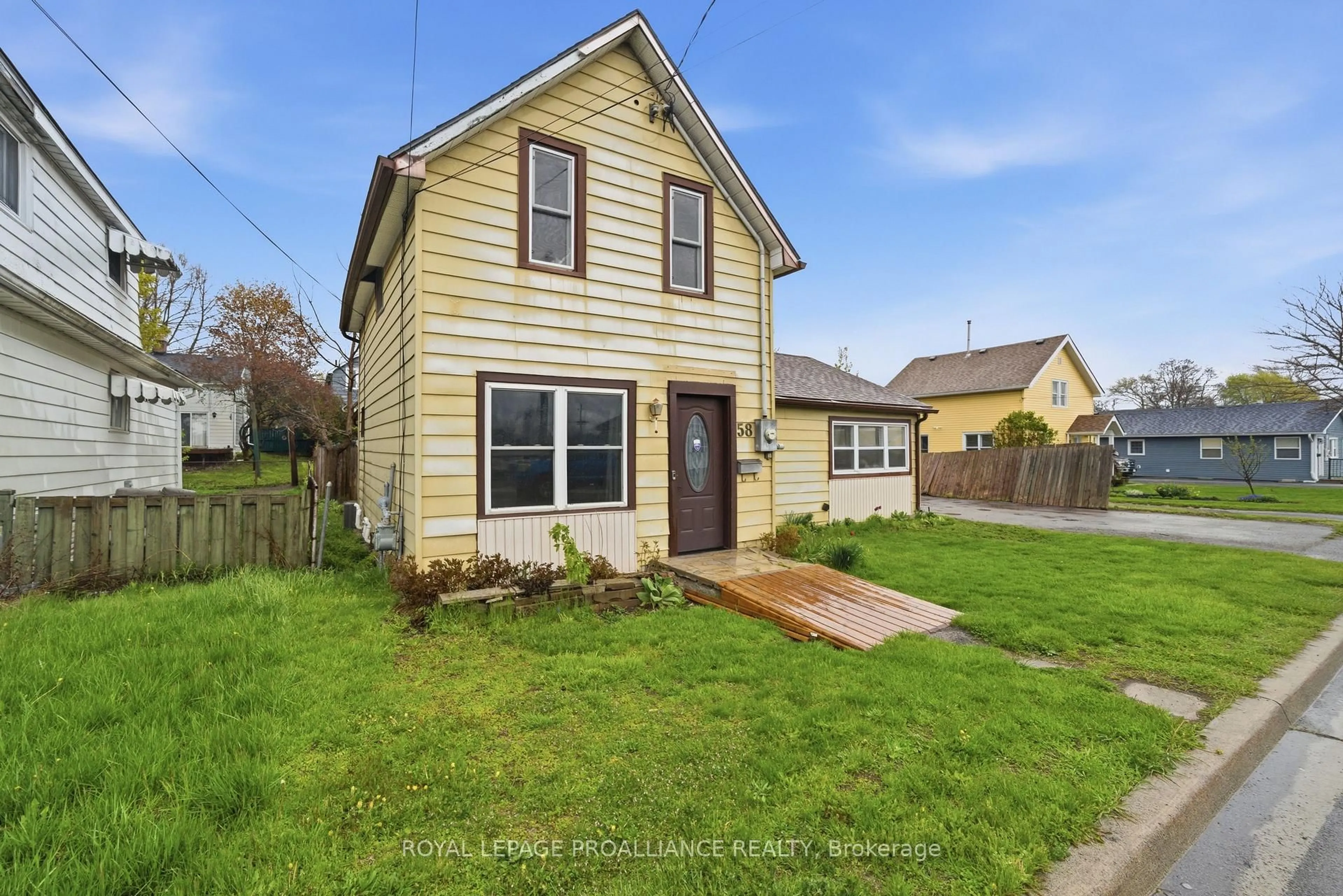A pic from outside/outdoor area/front of a property/back of a property/a pic from drone, street for 58 John St, Quinte West Ontario K8V 1J8
