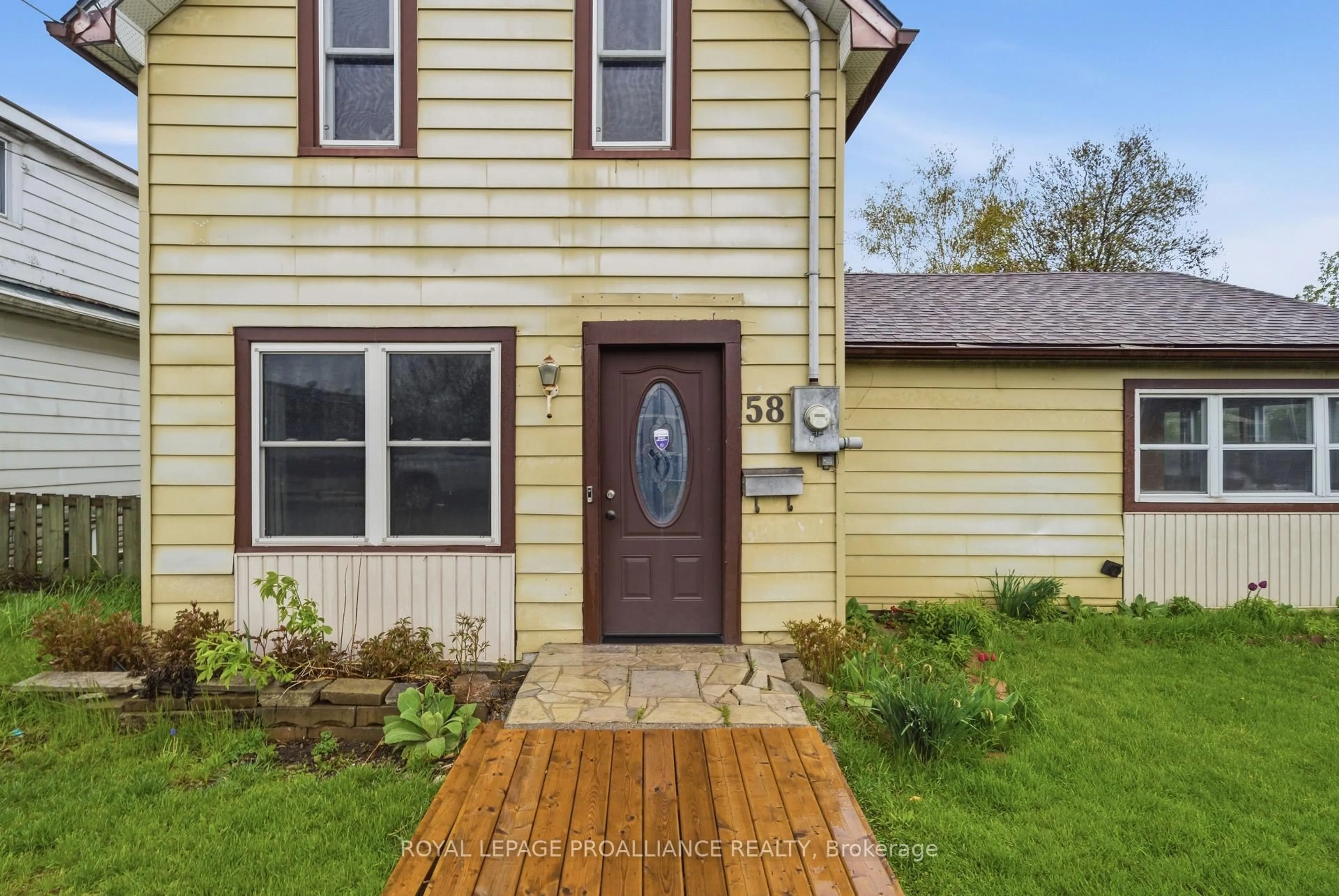 Home with vinyl exterior material, street for 58 John St, Quinte West Ontario K8V 1J8