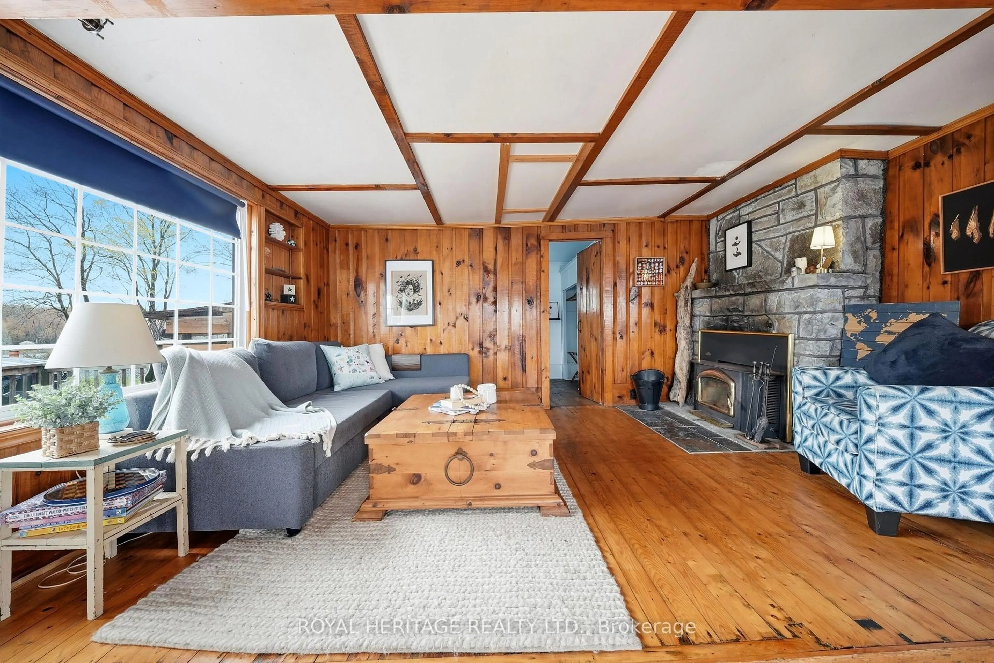 Living room with furniture, wood/laminate floor for 13258 Highway 62 Way, Madoc Ontario K0K 2K0