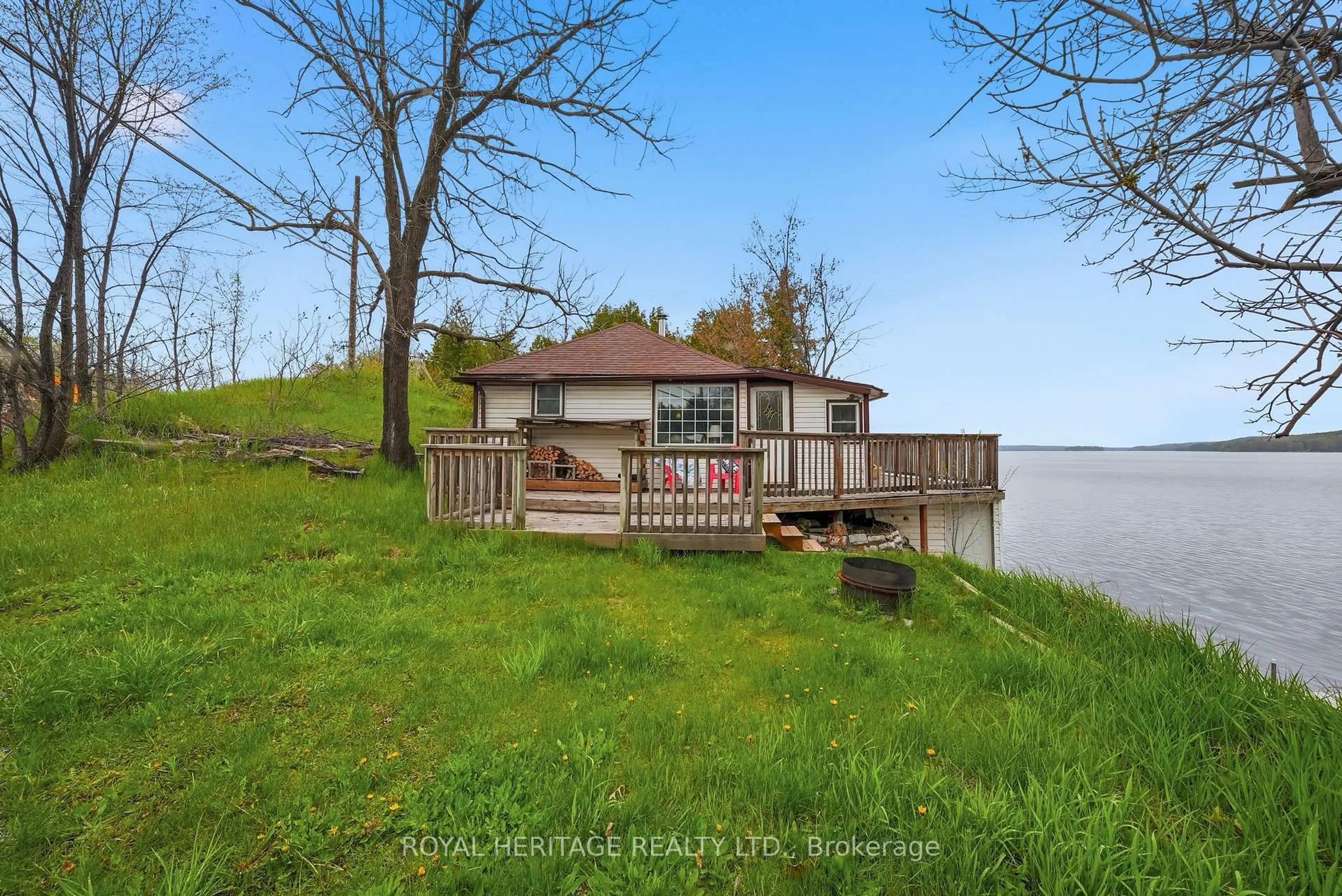 A pic from outside/outdoor area/front of a property/back of a property/a pic from drone, water/lake/river/ocean view for 13258 Highway 62 Way, Madoc Ontario K0K 2K0