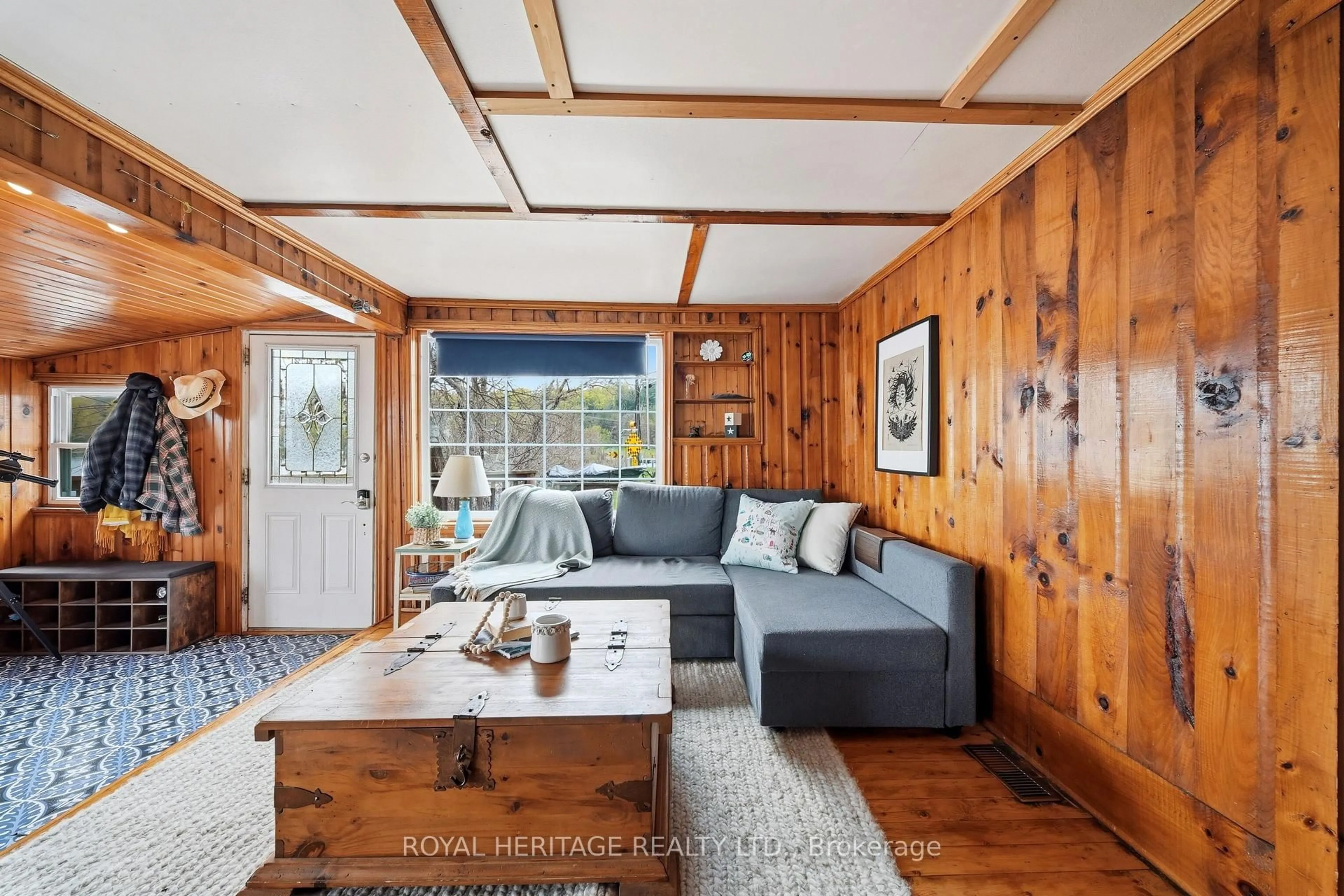 Living room with furniture, wood/laminate floor for 13258 Highway 62 Way, Madoc Ontario K0K 2K0