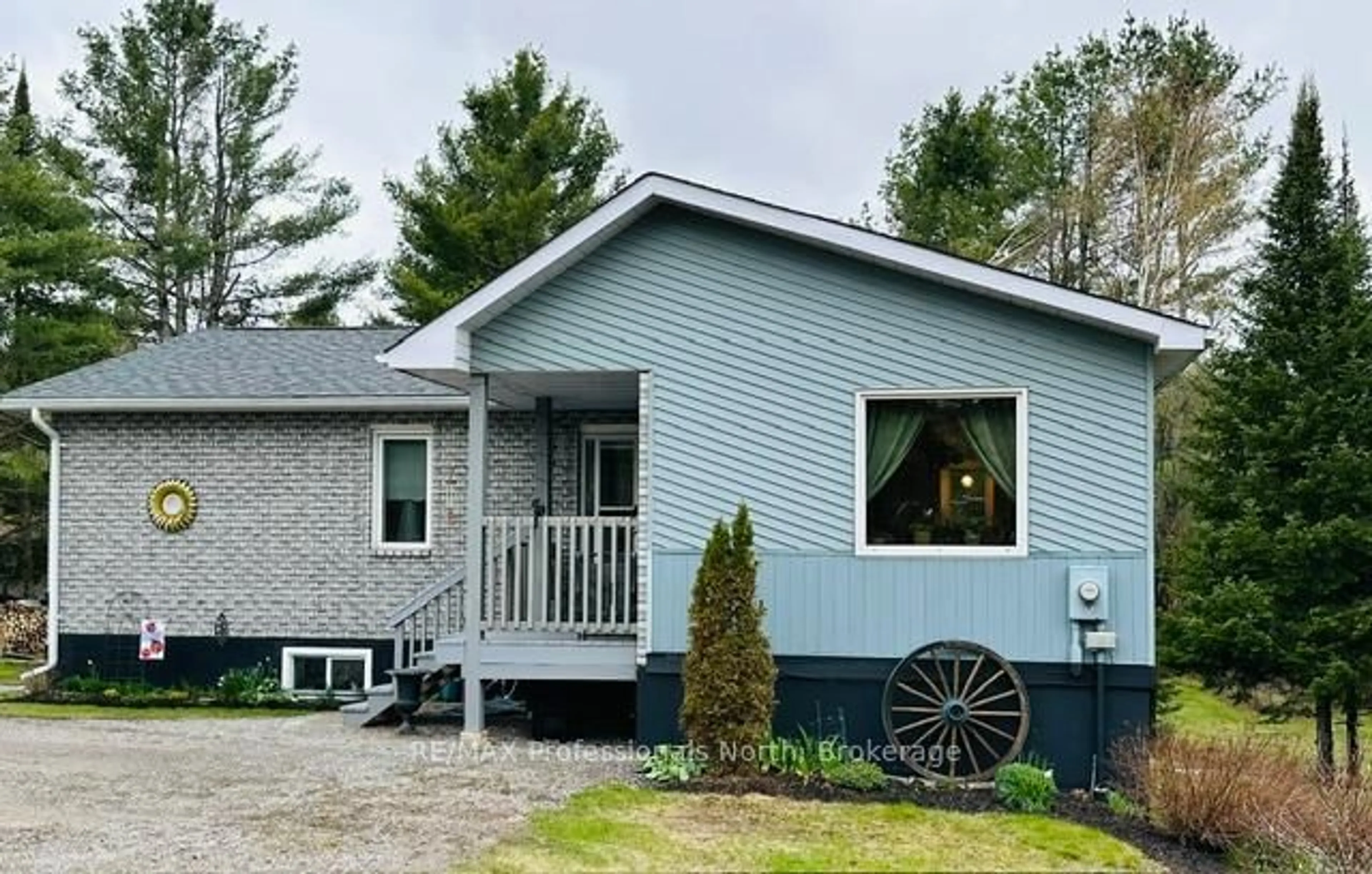 Home with vinyl exterior material, street for 1297 Hunter Creek Rd, Minden Hills Ontario K0M 2K0