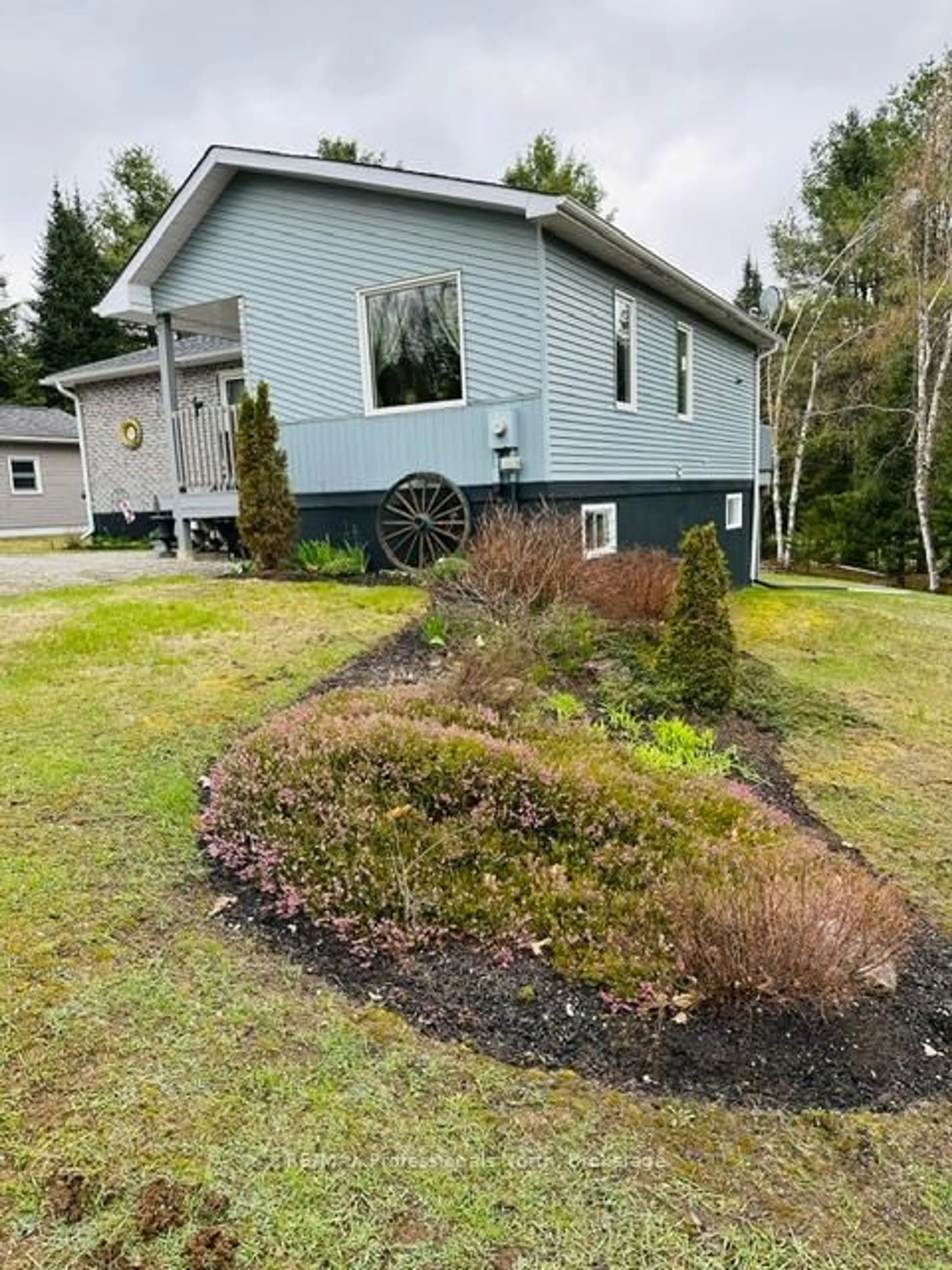 A pic from outside/outdoor area/front of a property/back of a property/a pic from drone, unknown for 1297 Hunter Creek Rd, Minden Hills Ontario K0M 2K0