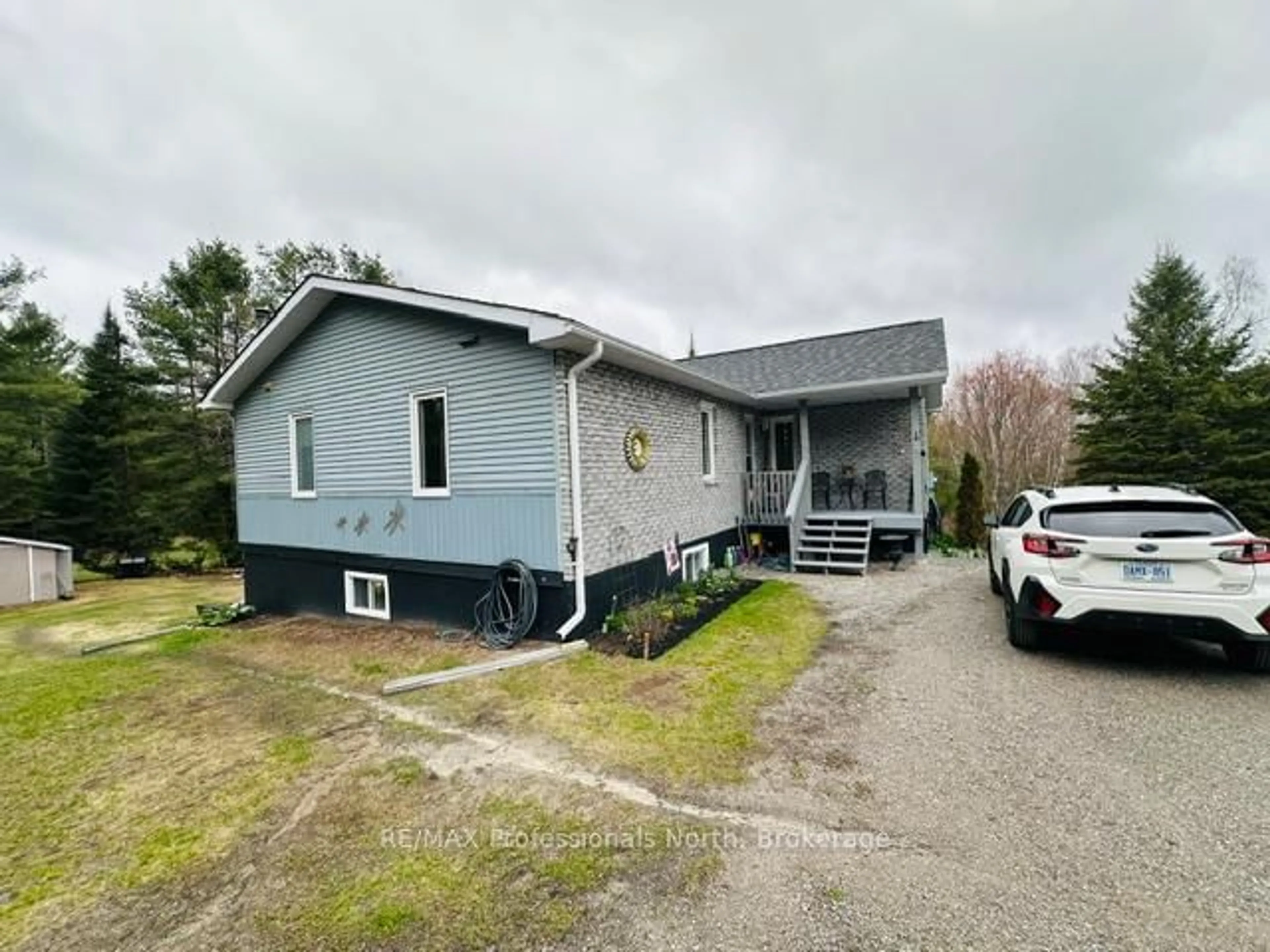A pic from outside/outdoor area/front of a property/back of a property/a pic from drone, building for 1297 Hunter Creek Rd, Minden Hills Ontario K0M 2K0