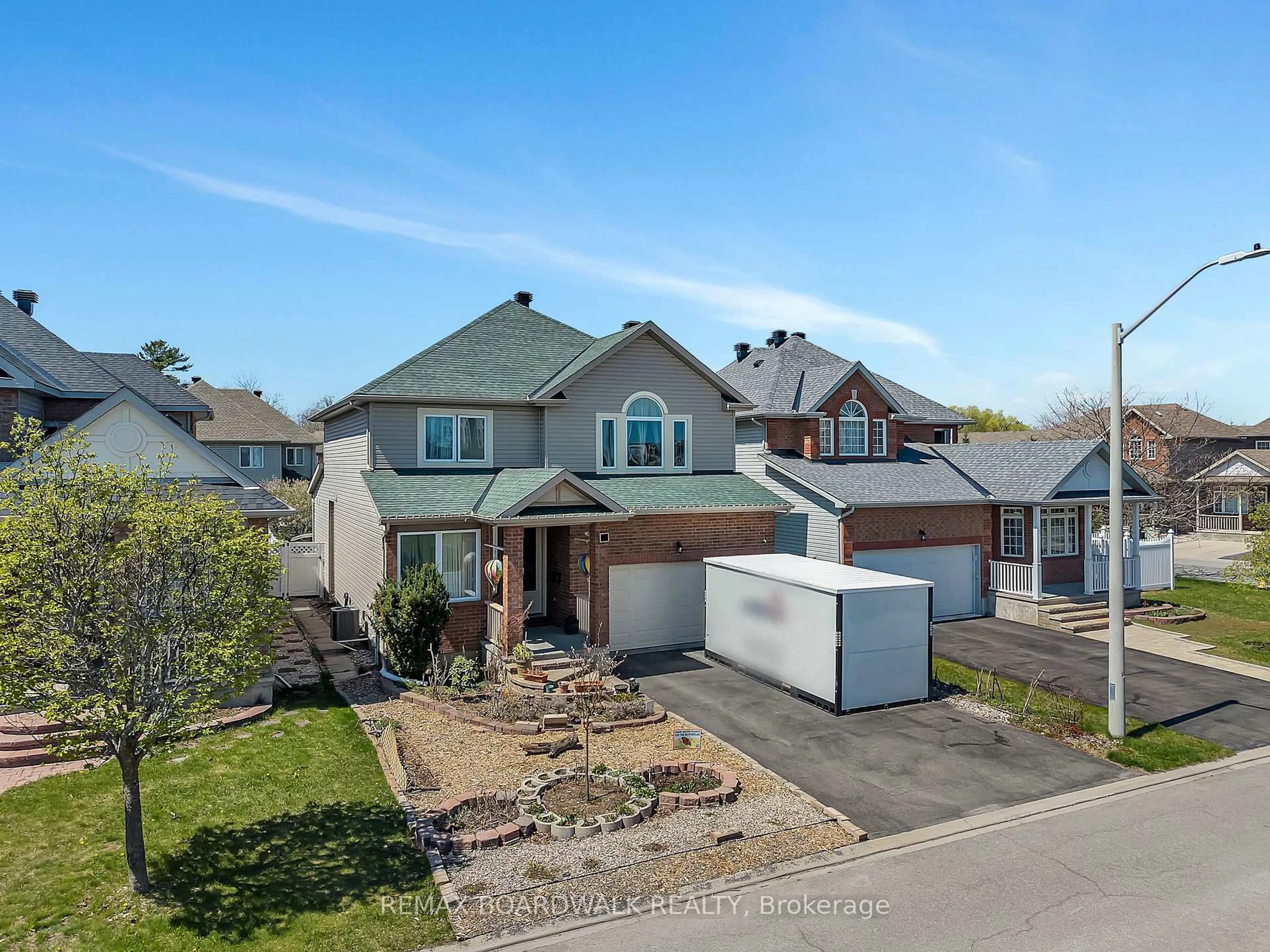 A pic from outside/outdoor area/front of a property/back of a property/a pic from drone, street for 102 Mosswood Crt, Ottawa Ontario K1V 0N6