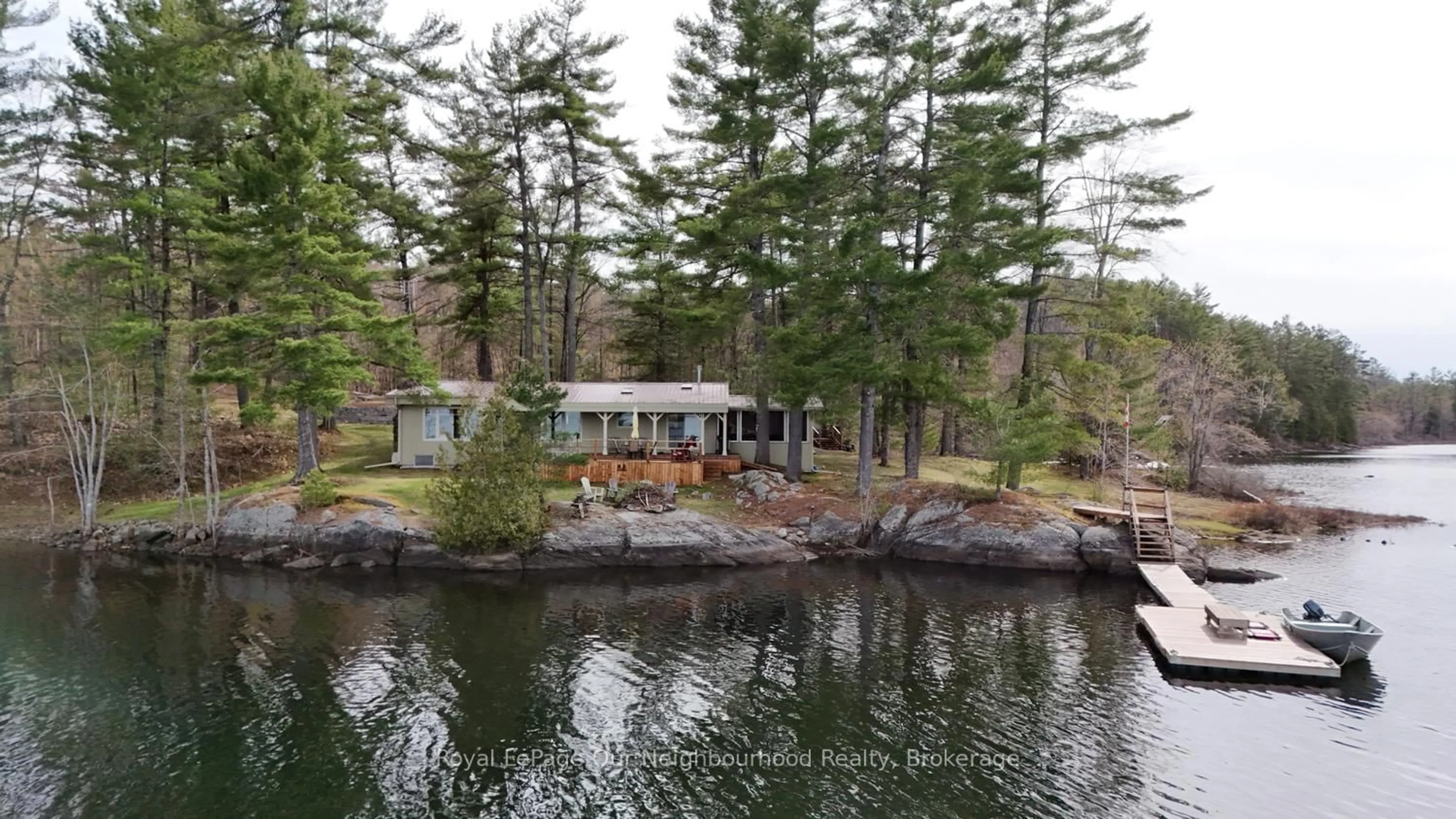 A pic from outside/outdoor area/front of a property/back of a property/a pic from drone, water/lake/river/ocean view for 823 Tangamong Rd, Limoges Ontario K0K 2M0