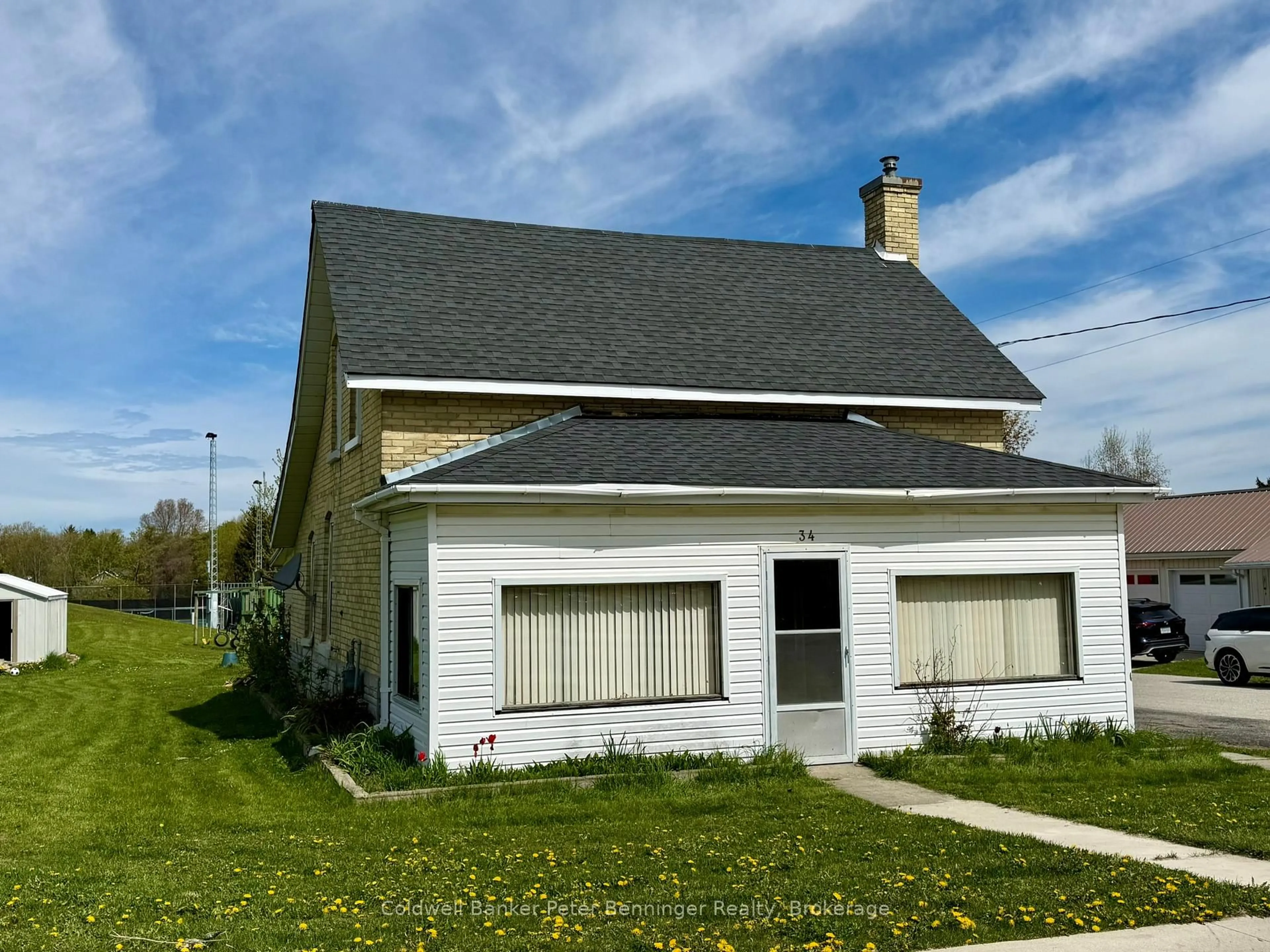 Home with vinyl exterior material, street for 34 McGivern St, Brockton Ontario N0G 2V0
