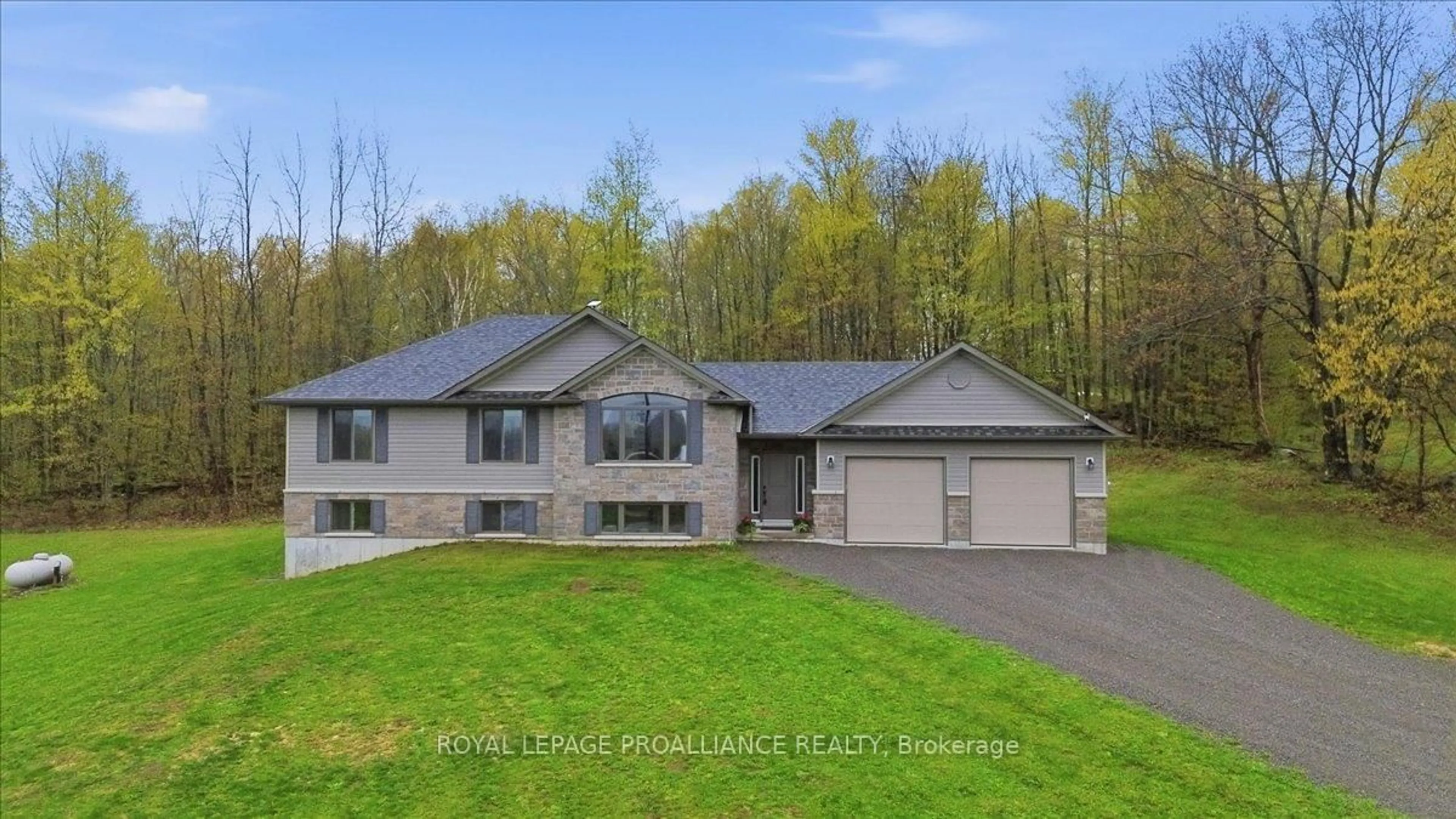 Home with vinyl exterior material, street for 70 Livingwood Cres, Madoc Ontario K0K 2K0