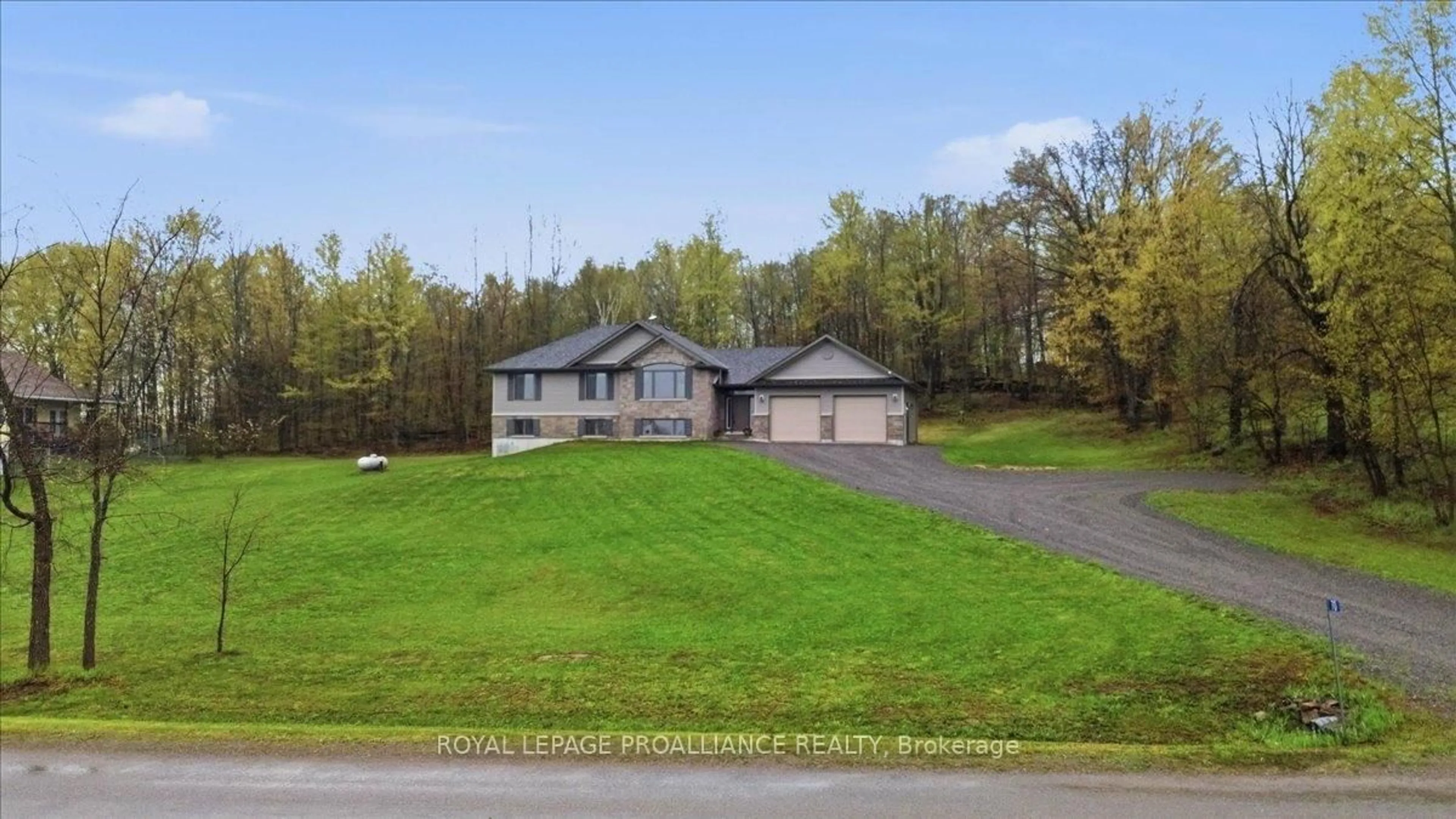 A pic from outside/outdoor area/front of a property/back of a property/a pic from drone, street for 70 Livingwood Cres, Madoc Ontario K0K 2K0