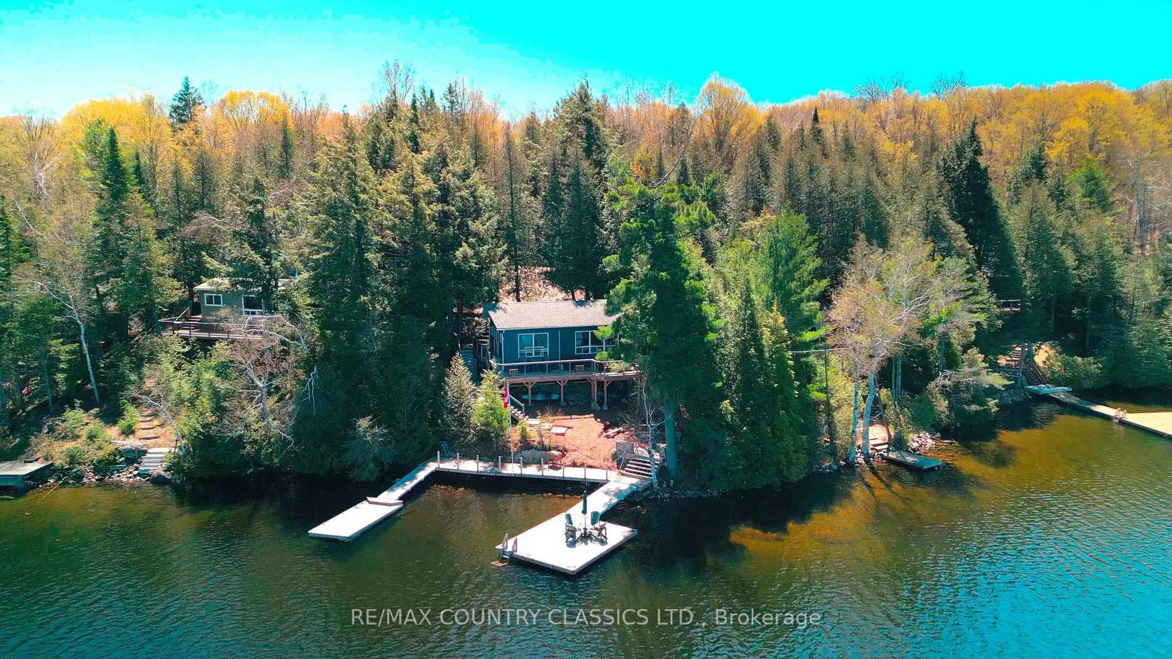 A pic from outside/outdoor area/front of a property/back of a property/a pic from drone, water/lake/river/ocean view for 204 Blue Heron Lane, North Kawartha Ontario K0L 1A0