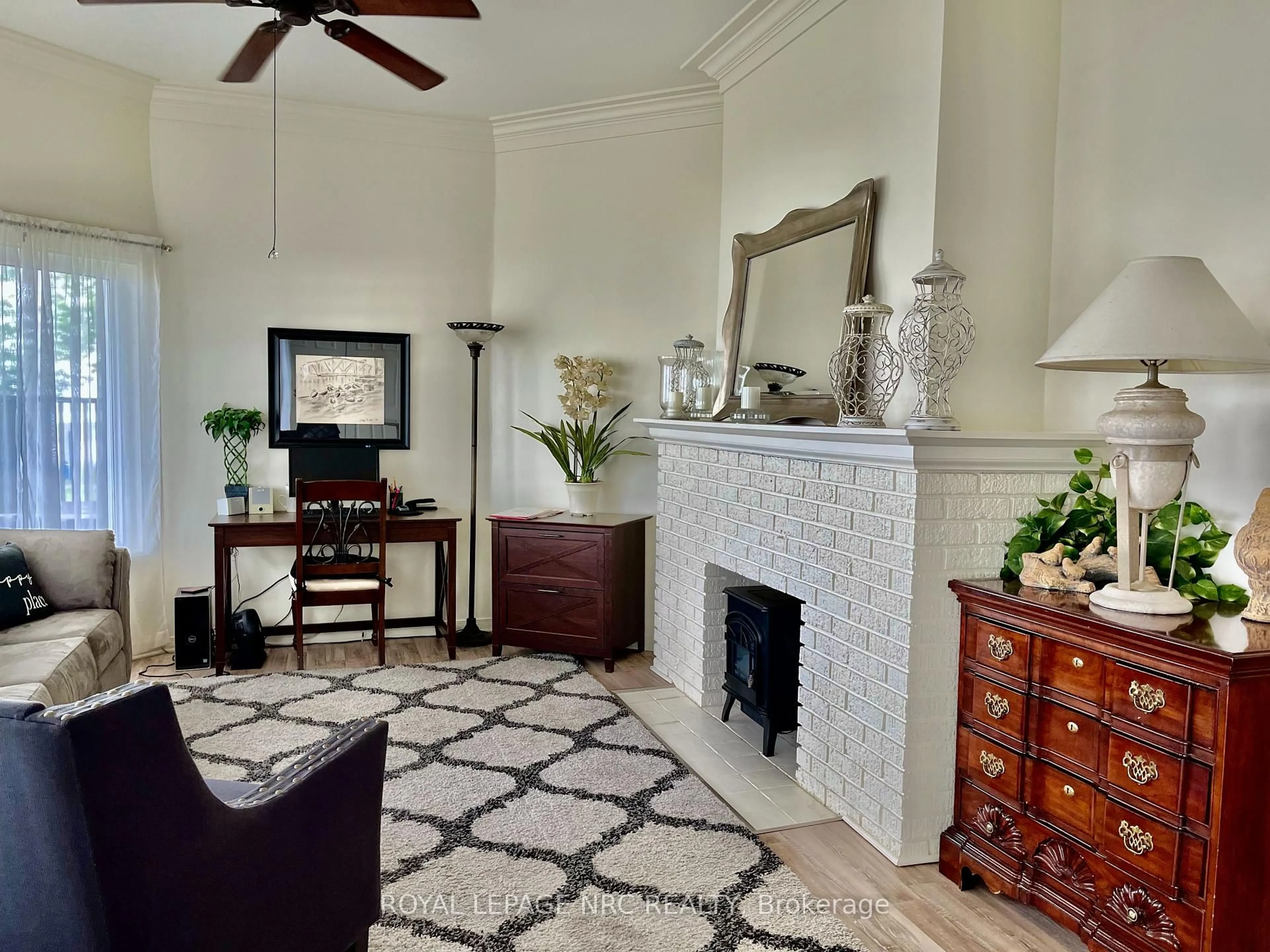 Living room with furniture, ceramic/tile floor for 56 West St, Port Colborne Ontario L3K 4C8