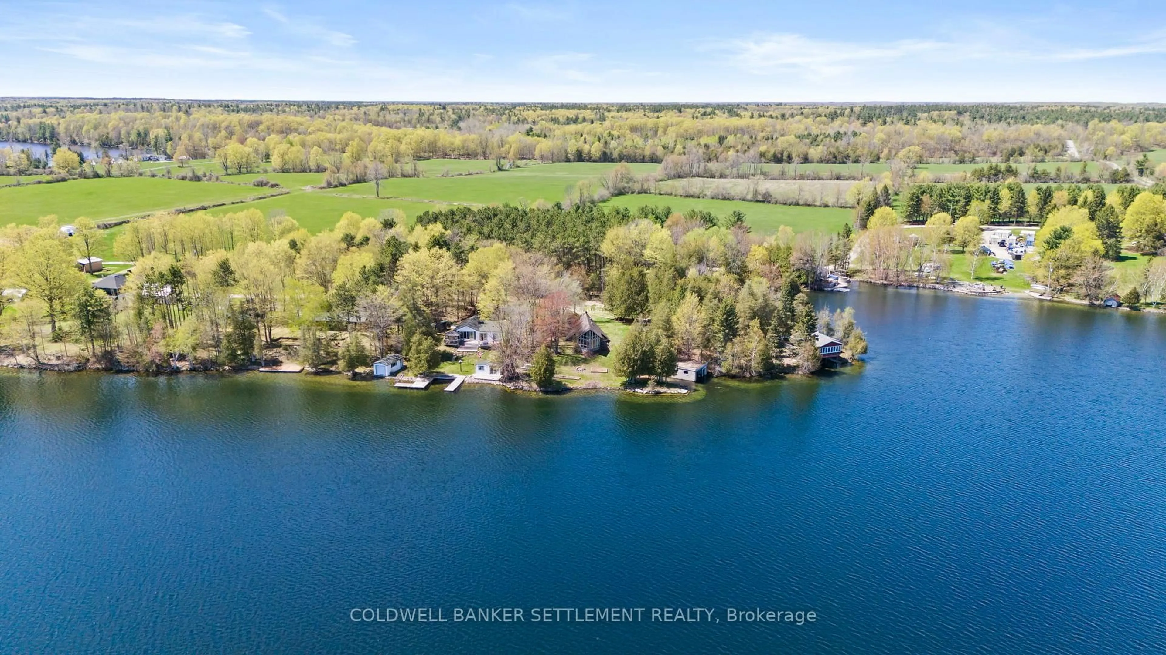 A pic from outside/outdoor area/front of a property/back of a property/a pic from drone, water/lake/river/ocean view for 303 Dragonfly Lane, Perth Ontario K7H 3C7