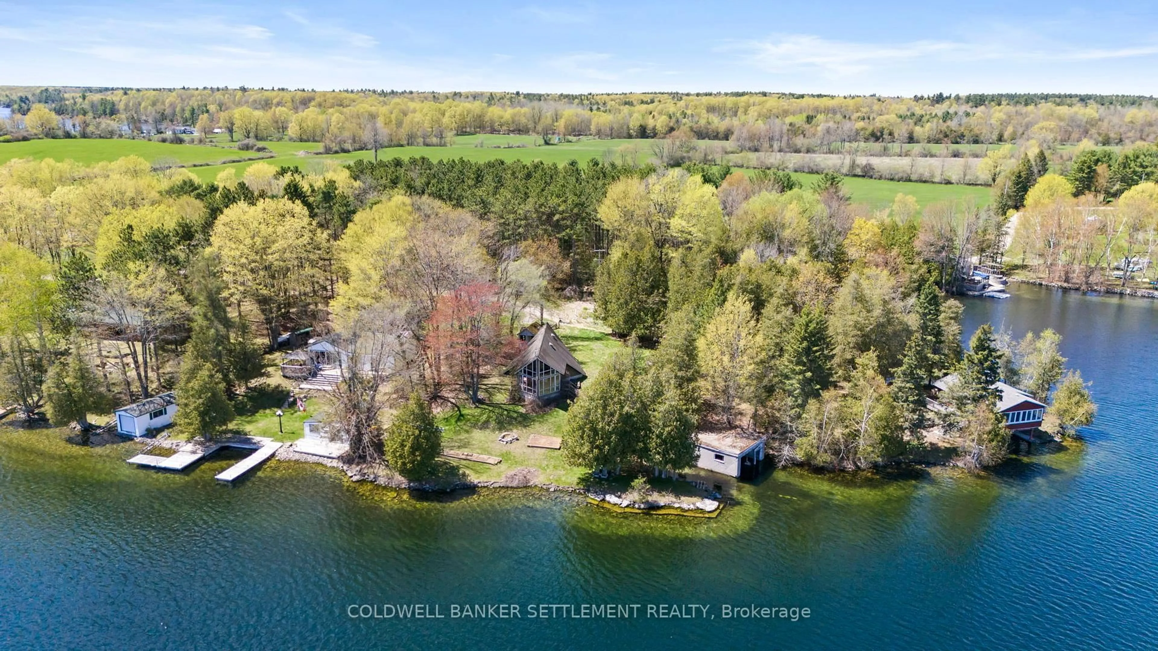 A pic from outside/outdoor area/front of a property/back of a property/a pic from drone, water/lake/river/ocean view for 303 Dragonfly Lane, Perth Ontario K7H 3C7