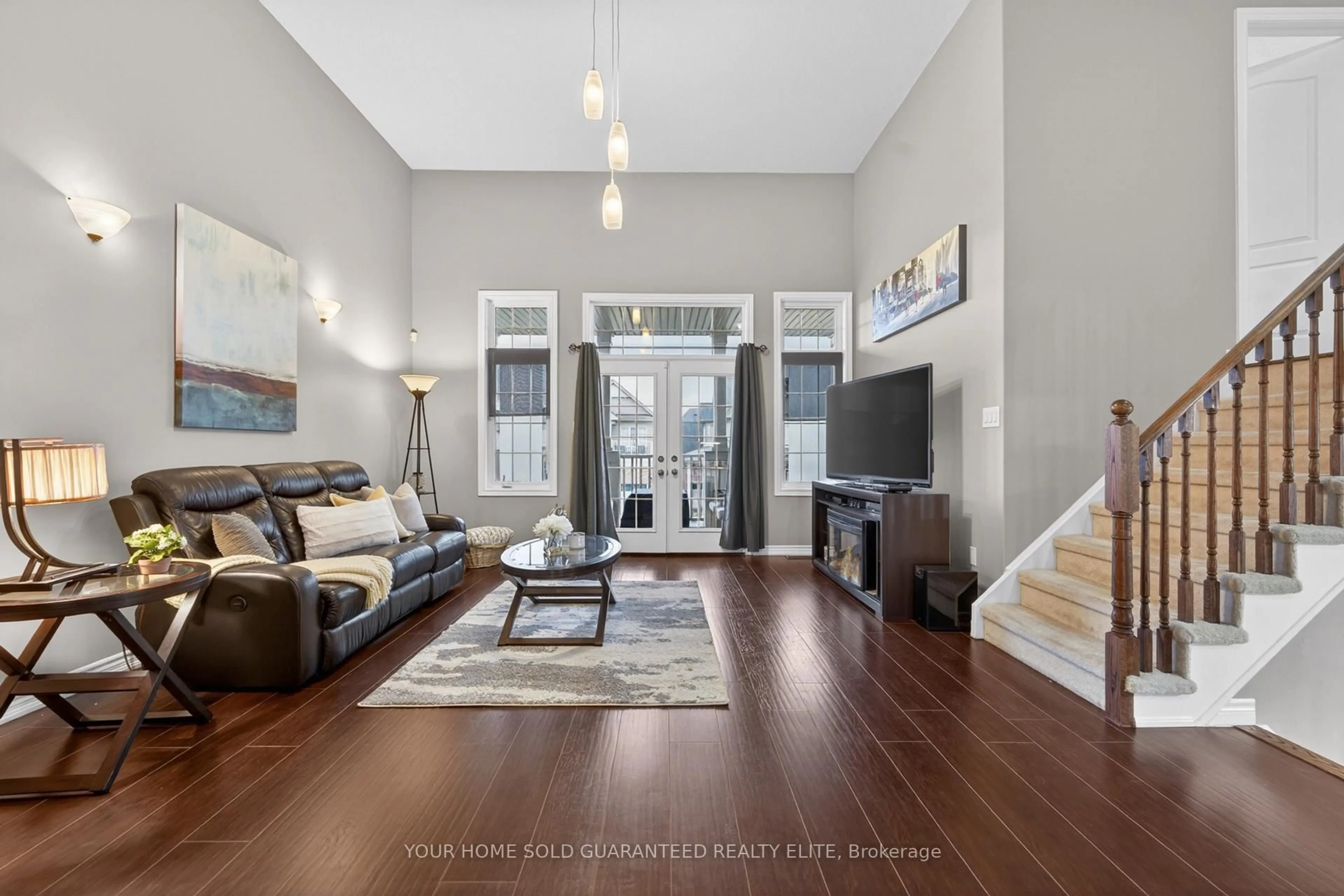 Living room with furniture, unknown for 136 Whitwell Way, Hamilton Ontario L0R 1C0