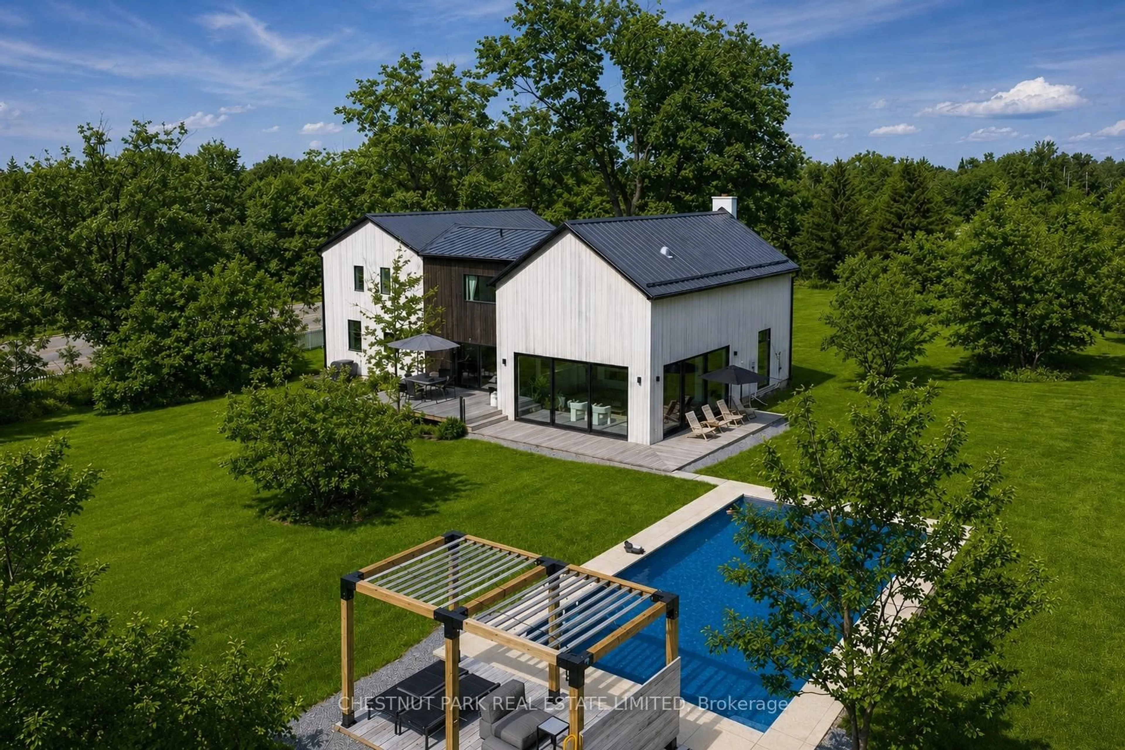 A pic from outside/outdoor area/front of a property/back of a property/a pic from drone, unknown for 2468 County Road 15, Prince Edward County Ontario K0K 2W0