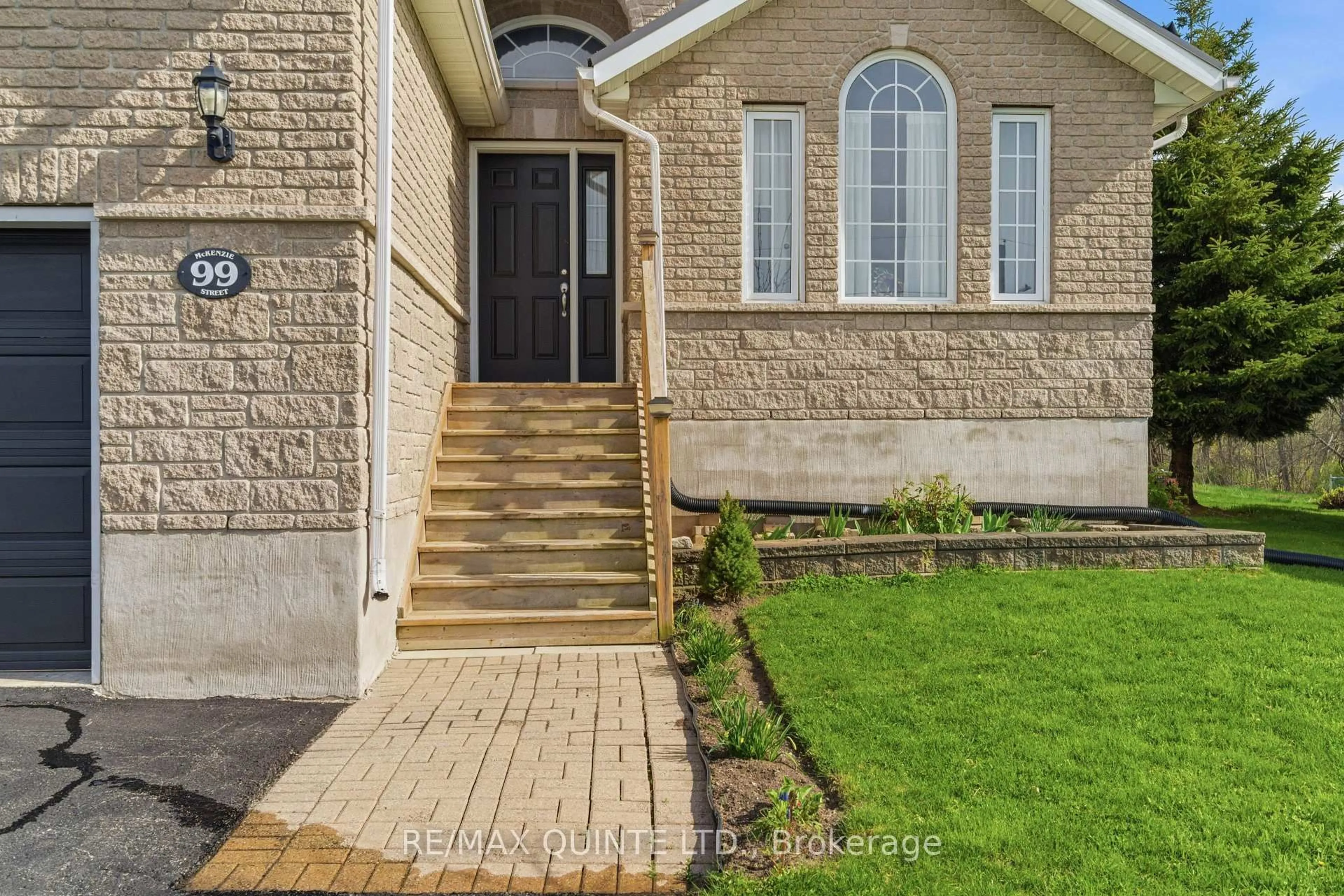 Home with brick exterior material, street for 99 McKenzie St, Madoc Ontario K0K 2K0
