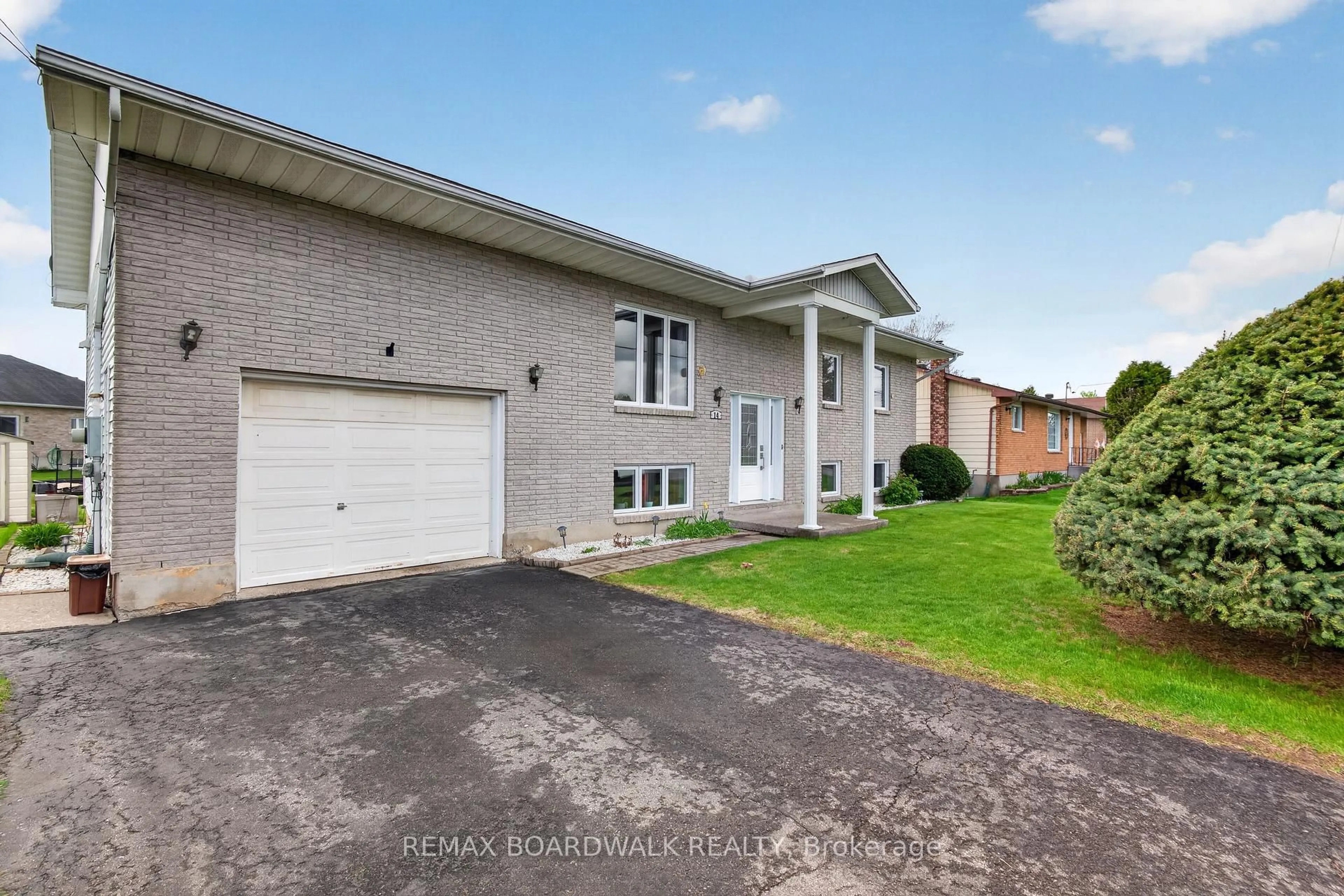 Home with brick exterior material, street for 14 Albert St, Casselman Ontario K0A 1M0