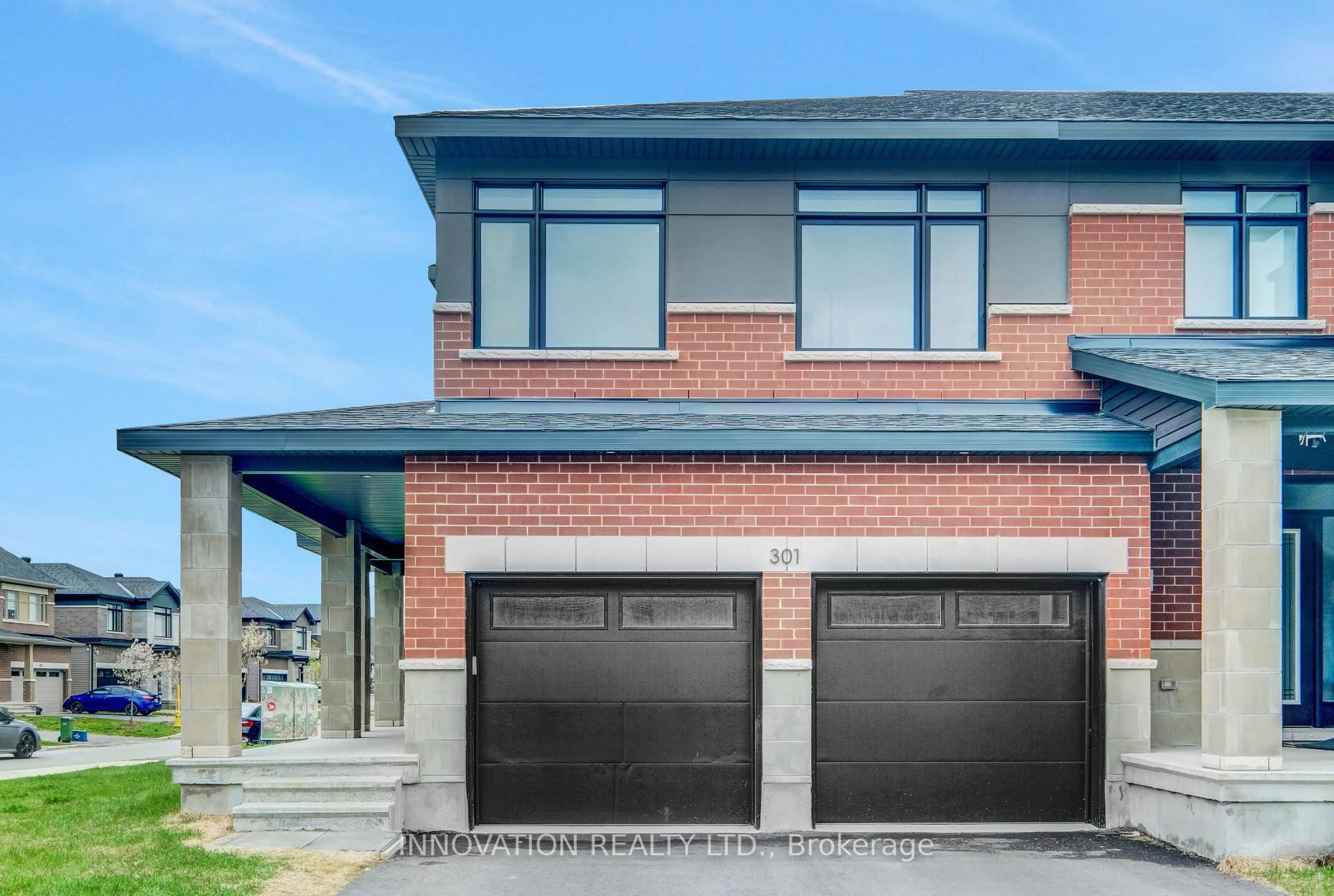 Home with brick exterior material, street for 301 Makobe Lane, Ottawa Ontario K4M 0L9