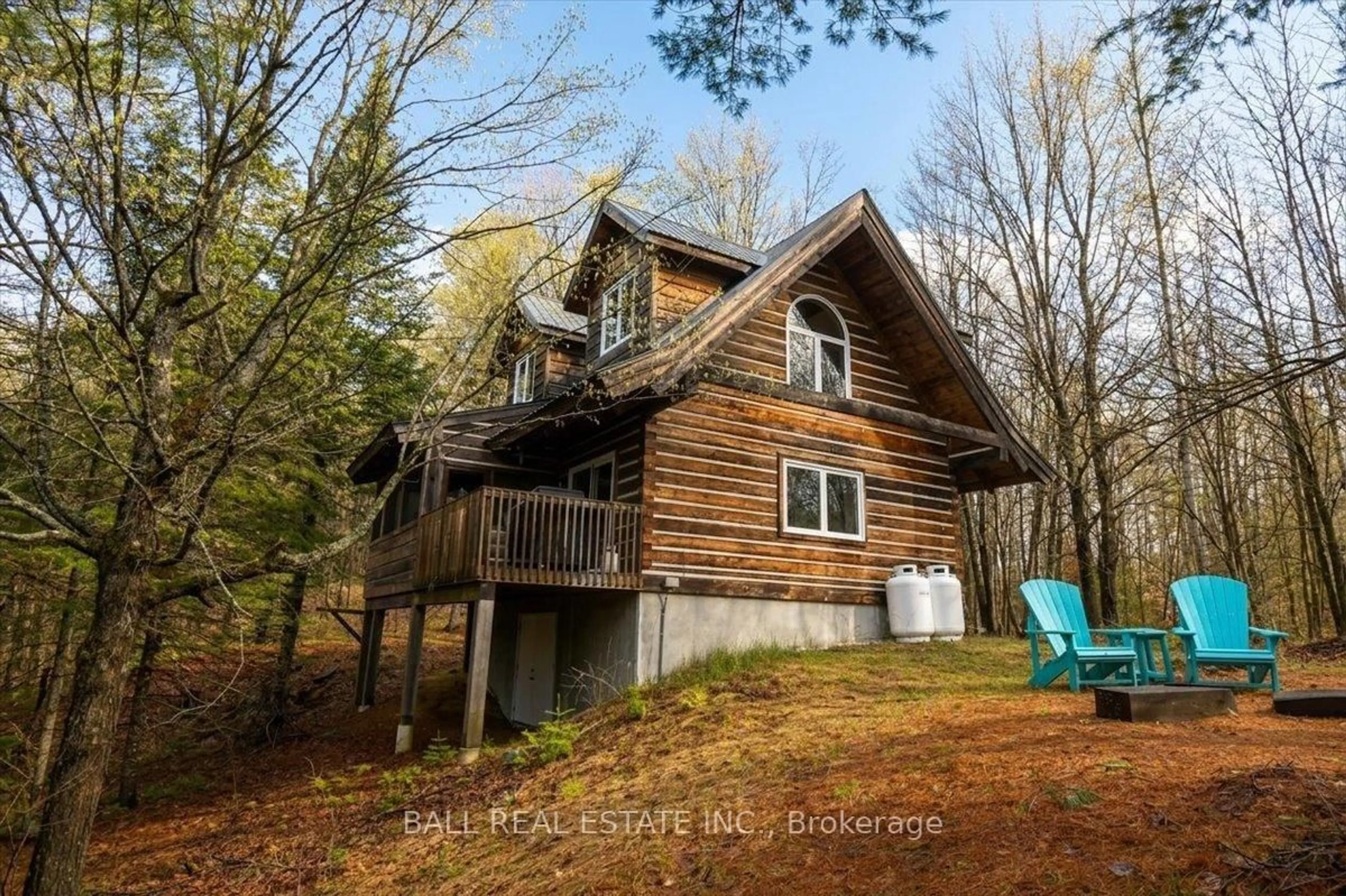A pic from outside/outdoor area/front of a property/back of a property/a pic from drone, water/lake/river/ocean view for 130F Finnegan Lane, Coe Hill Ontario K0L 1P0
