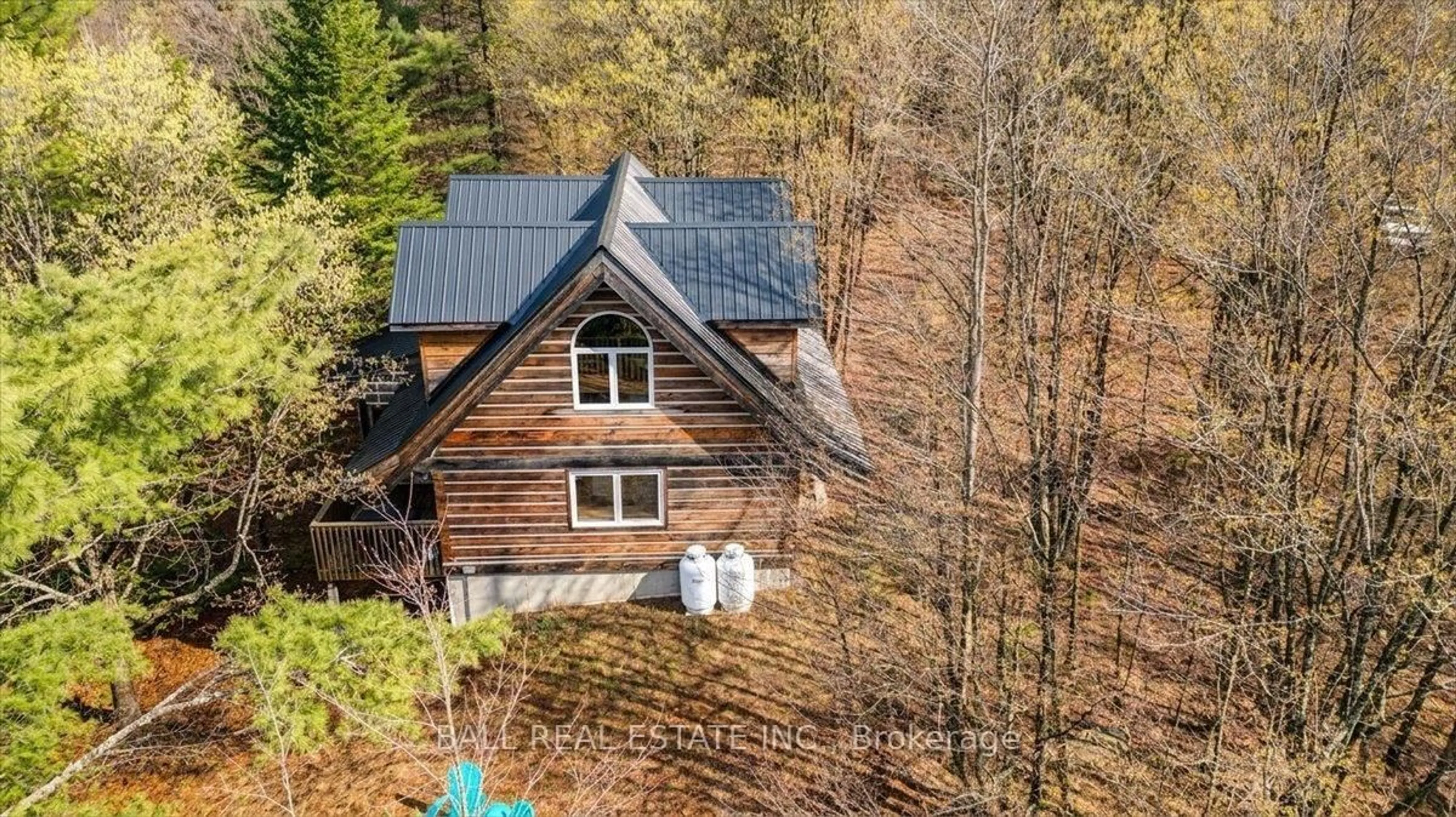 A pic from outside/outdoor area/front of a property/back of a property/a pic from drone, unknown for 130F Finnegan Lane, Coe Hill Ontario K0L 1P0