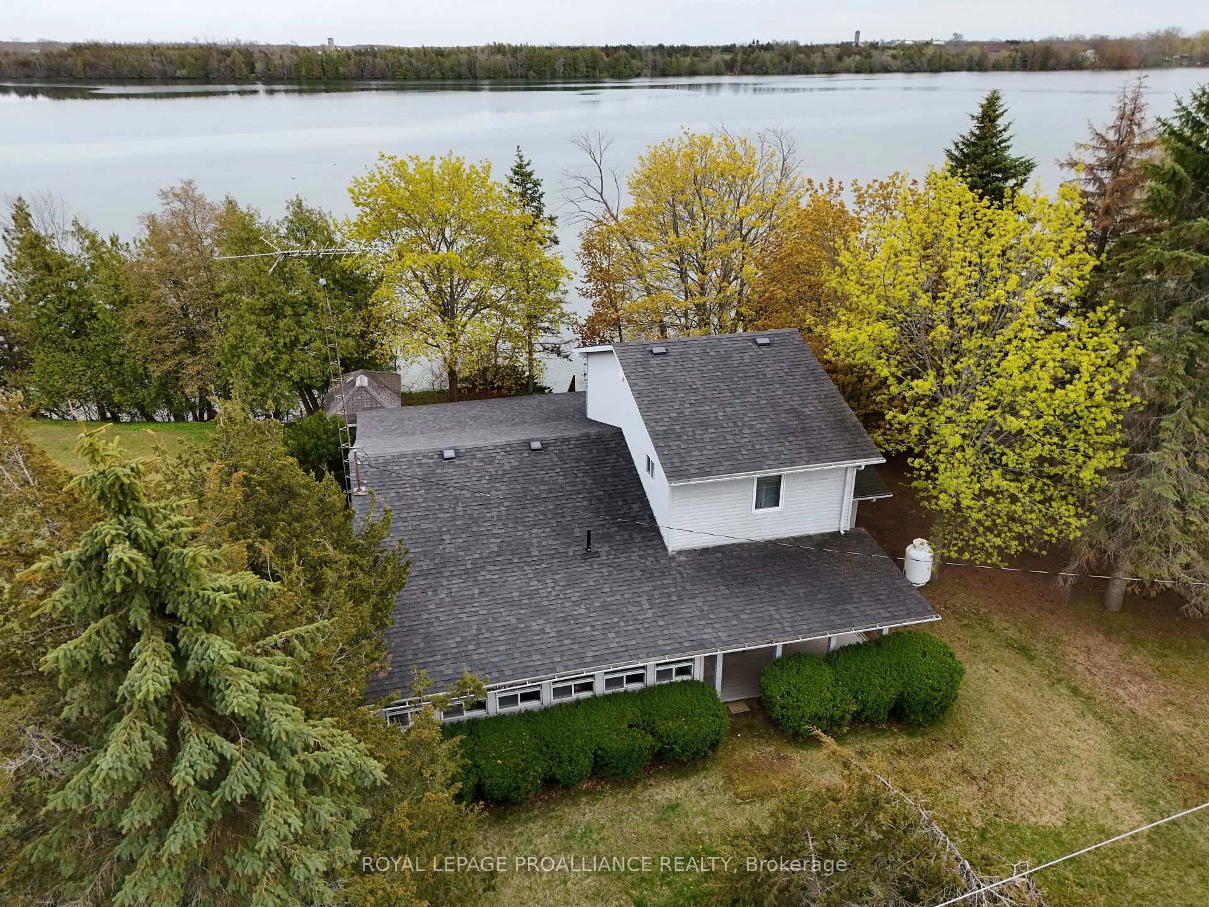 A pic from outside/outdoor area/front of a property/back of a property/a pic from drone, water/lake/river/ocean view for 133 Juniper Lane, Prince Edward County Ontario K0K 1A0