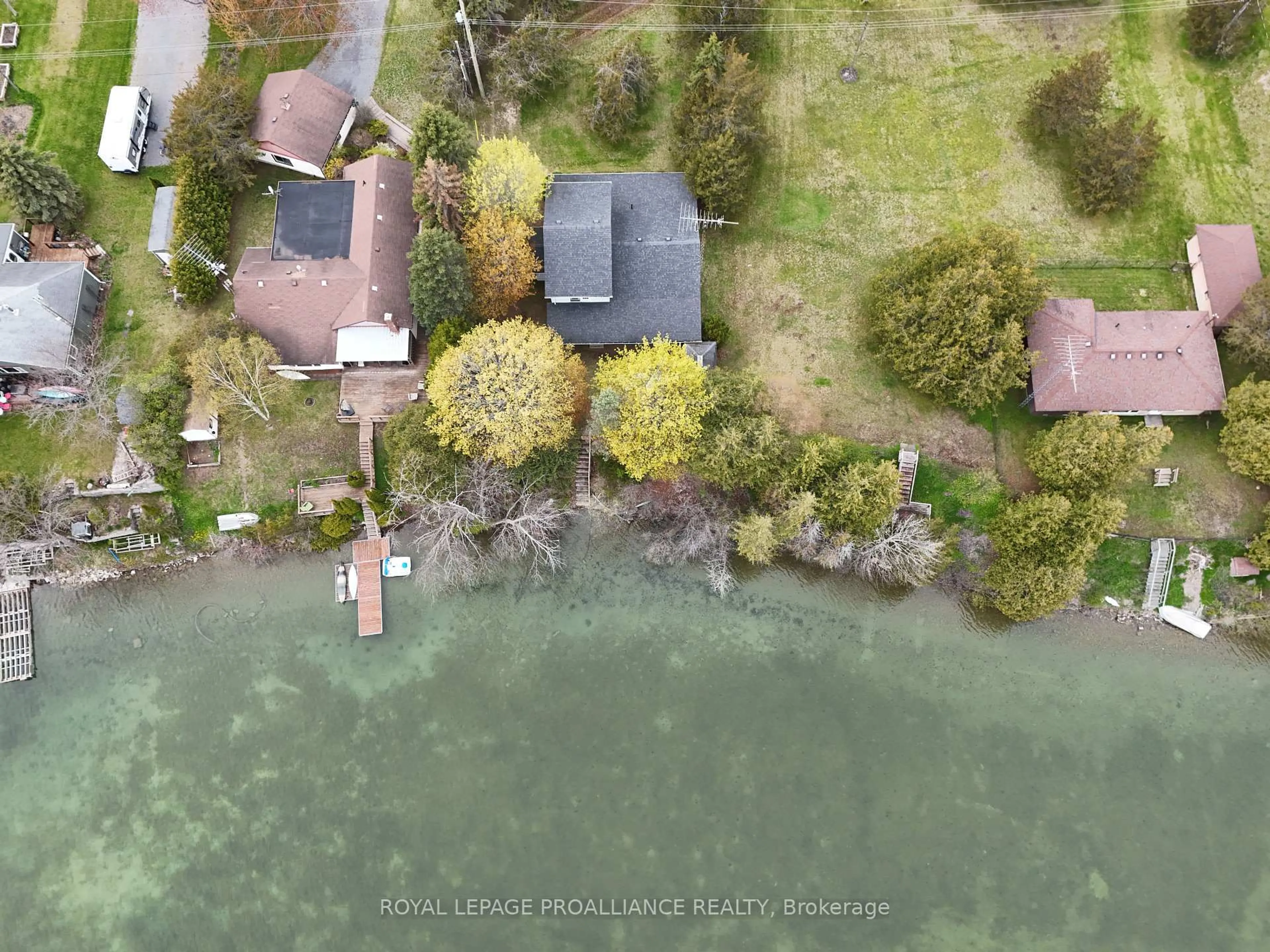 A pic from outside/outdoor area/front of a property/back of a property/a pic from drone, water/lake/river/ocean view for 133 Juniper Lane, Prince Edward County Ontario K0K 1A0