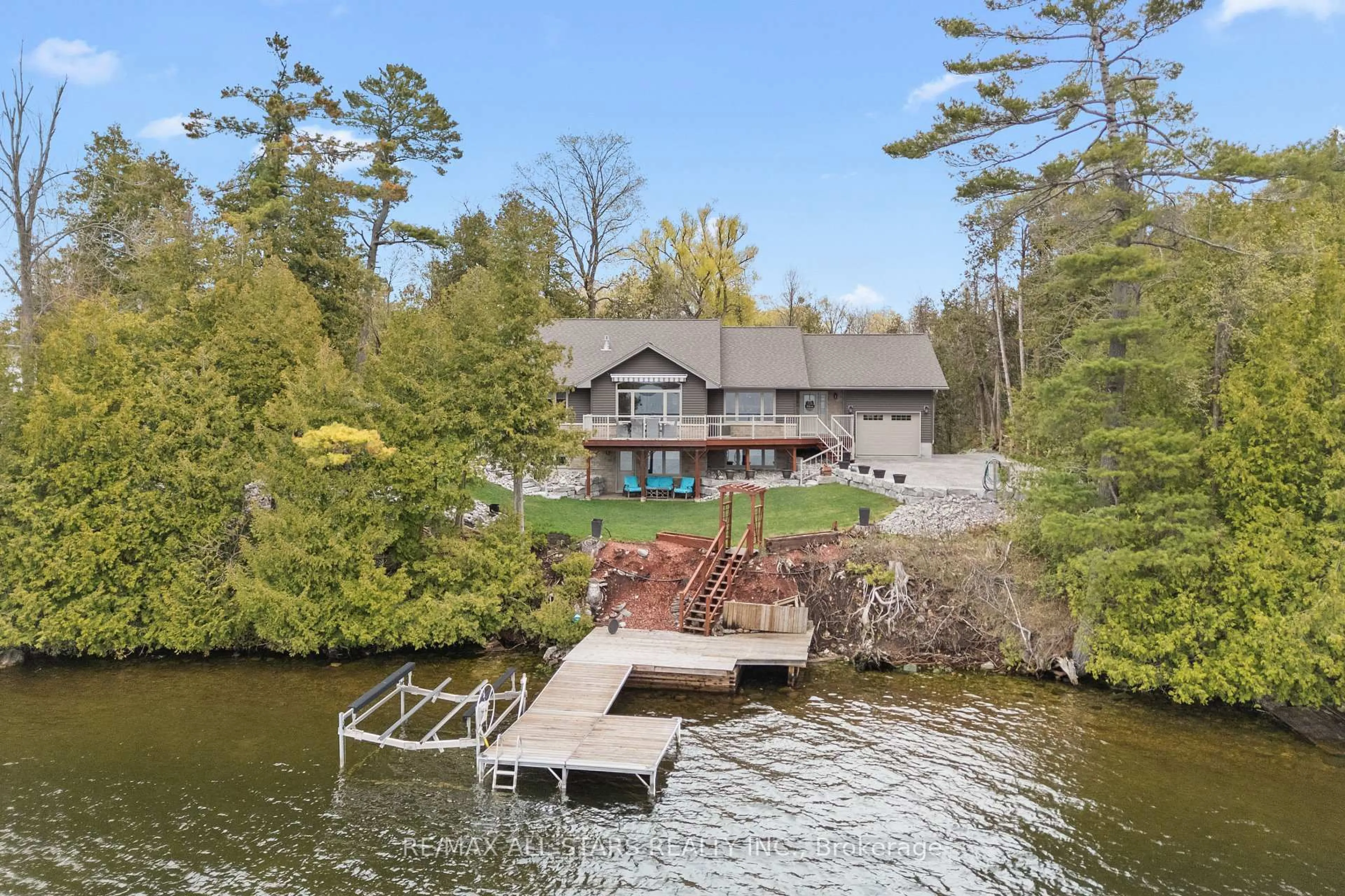 A pic from outside/outdoor area/front of a property/back of a property/a pic from drone, water/lake/river/ocean view for 39 Peace Point Rd, Kawartha Lakes Ontario K0M 1N0