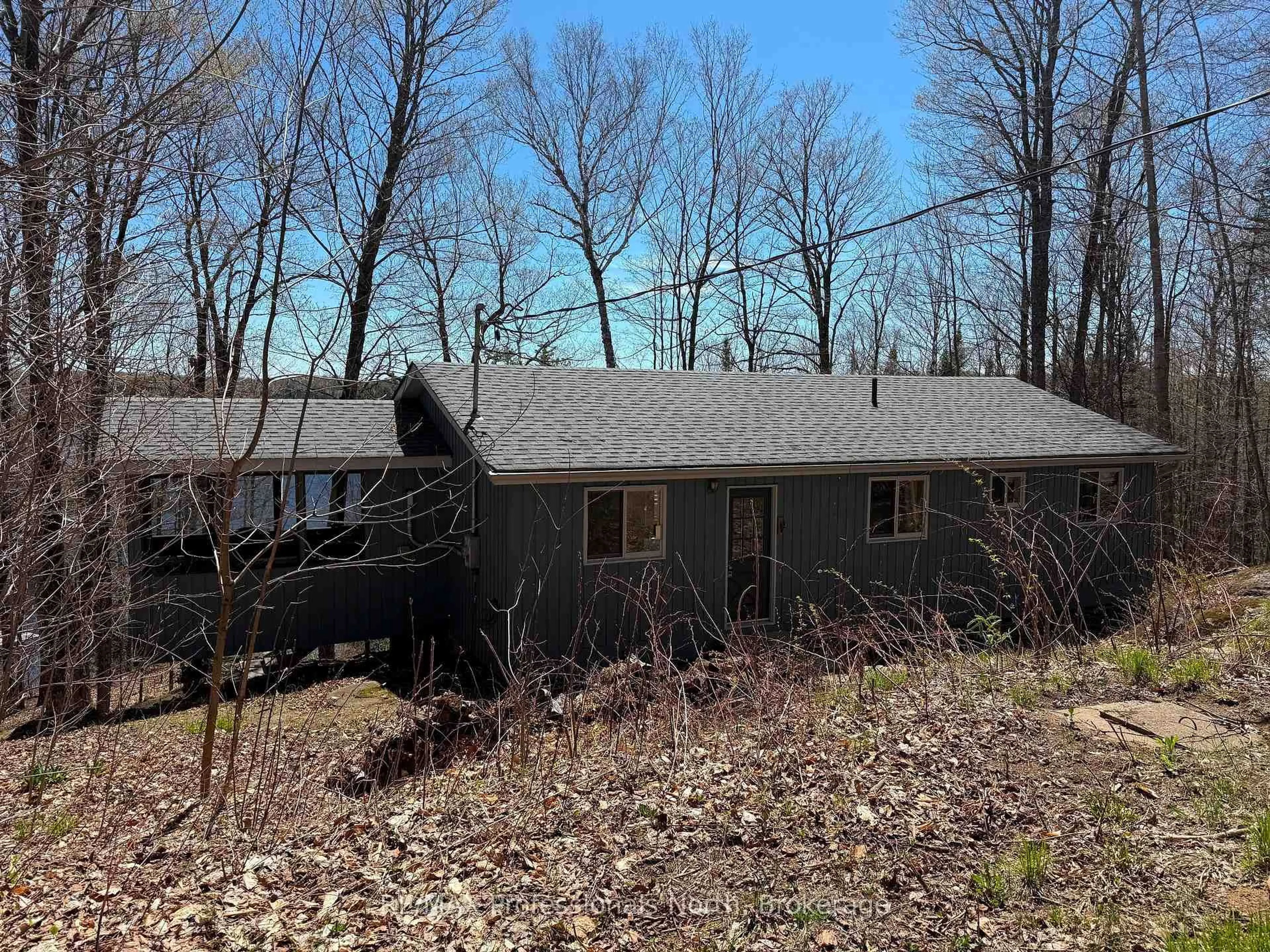 A pic from outside/outdoor area/front of a property/back of a property/a pic from drone, forest/trees view for 1226 Hubbard & Montgomery Lane, Highlands East Ontario K0M 1S0