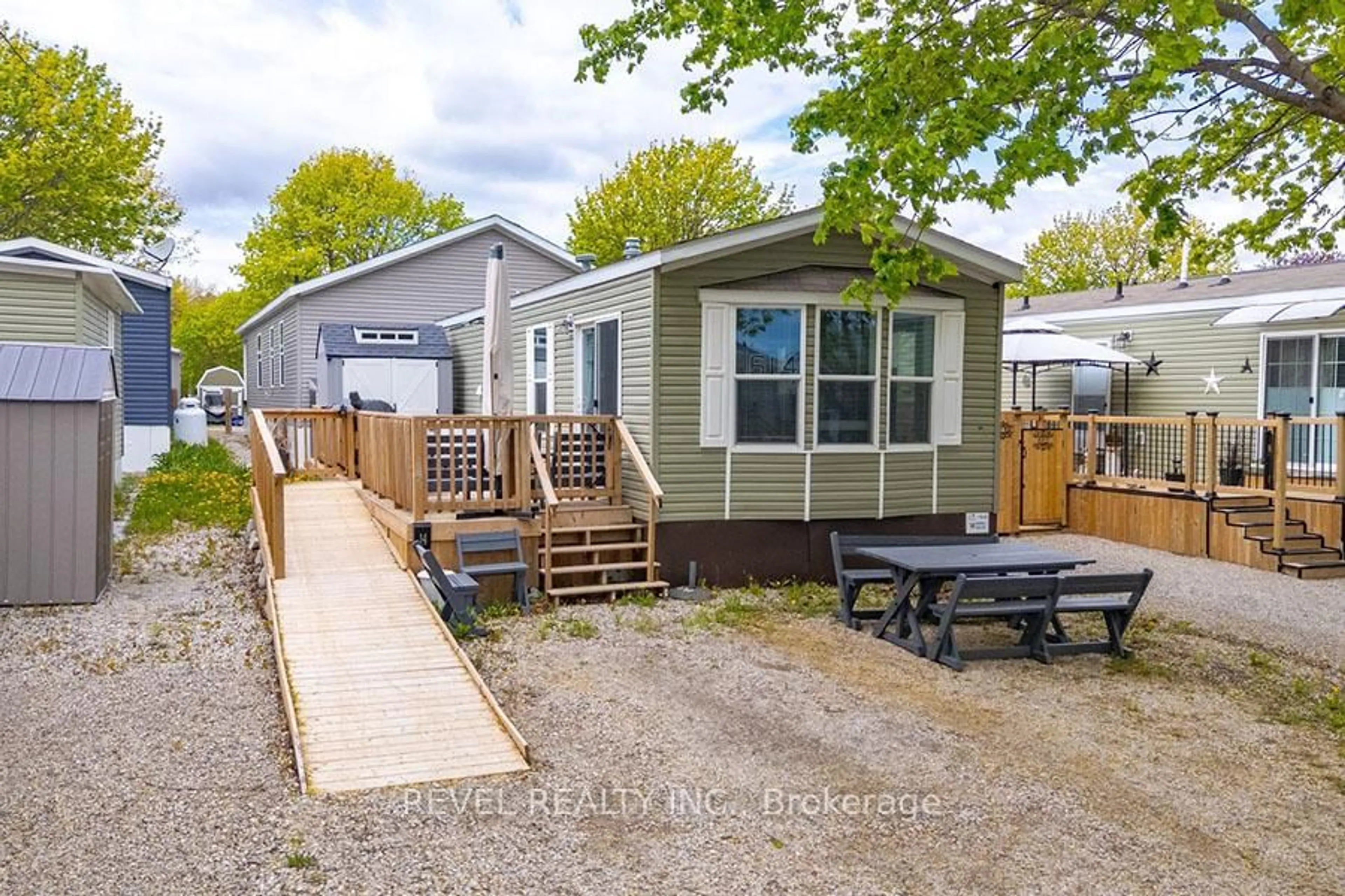 Home with vinyl exterior material, street for 99 Fourth Concession Rd #614, Brant Ontario N0E 1A0