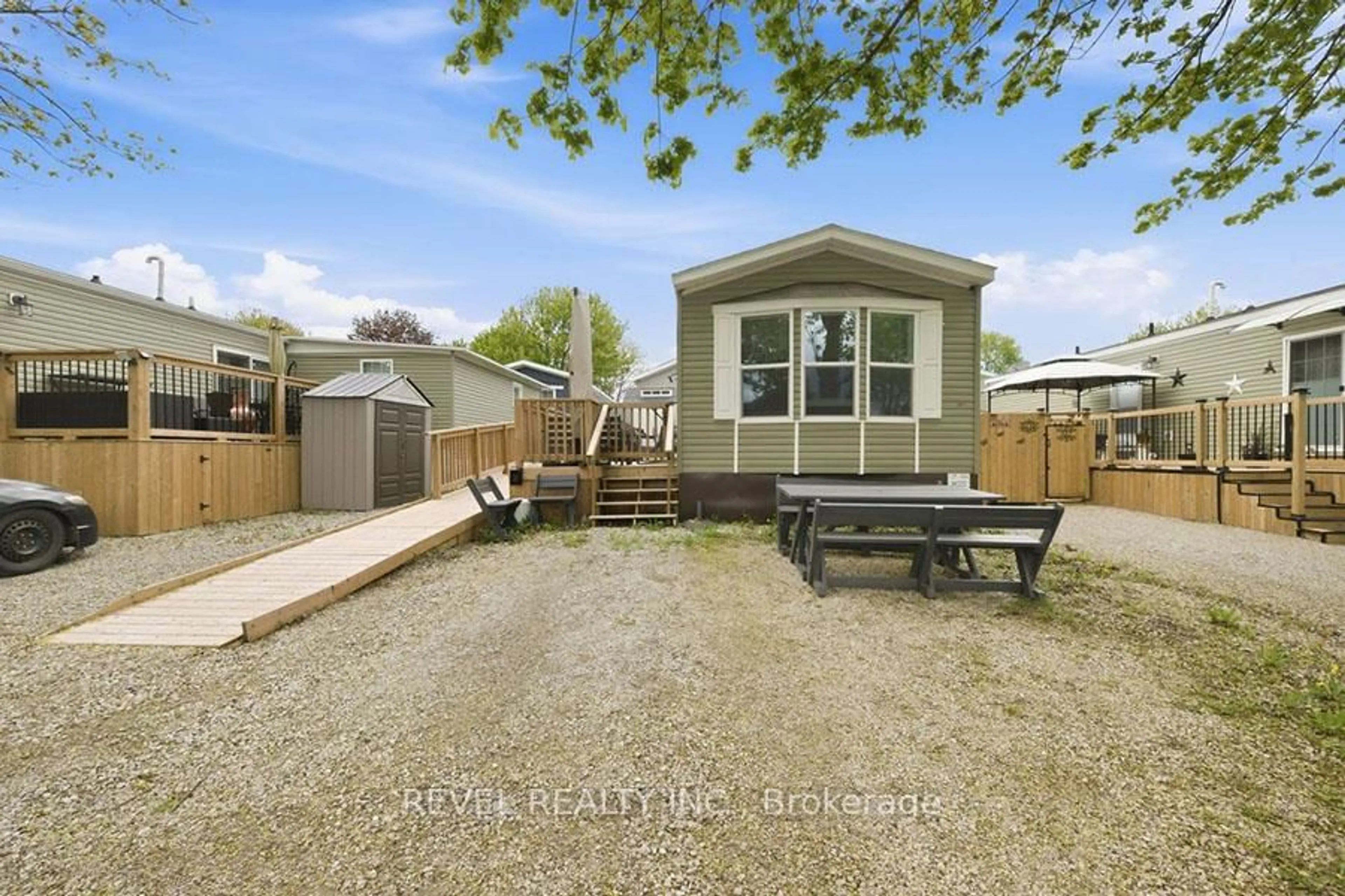 A pic from outside/outdoor area/front of a property/back of a property/a pic from drone, street for 99 Fourth Concession Rd #614, Brant Ontario N0E 1A0