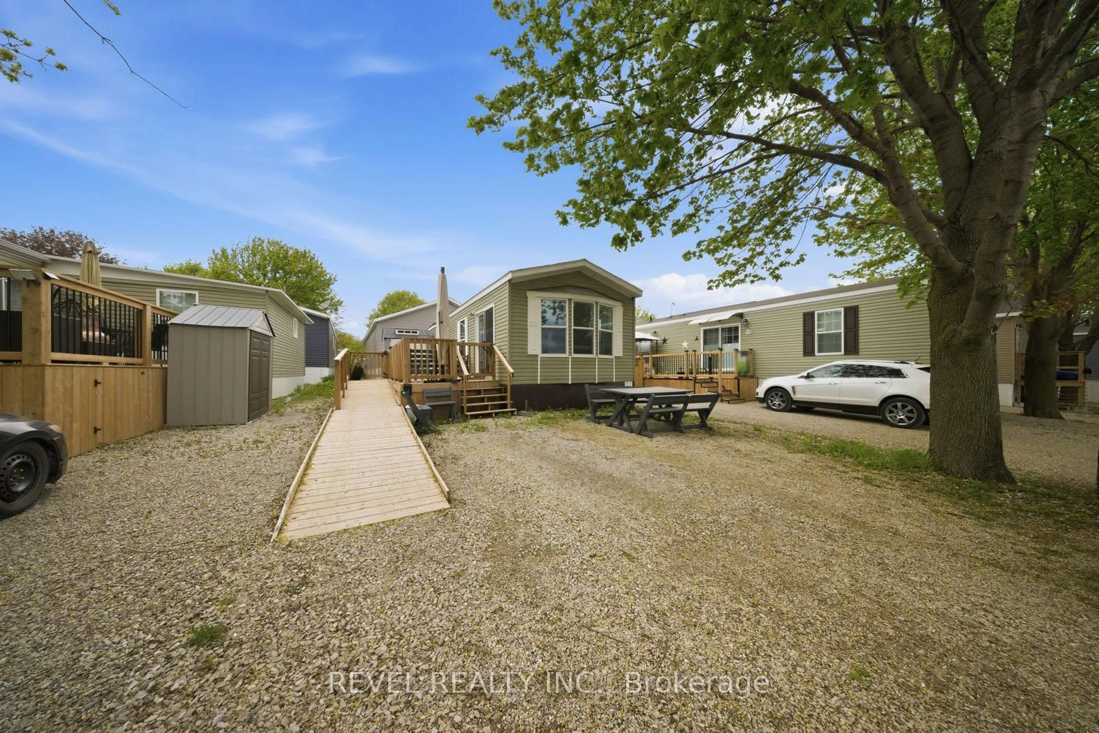 A pic from outside/outdoor area/front of a property/back of a property/a pic from drone, street for 99 Fourth Concession Rd #614, Brant Ontario N0E 1A0