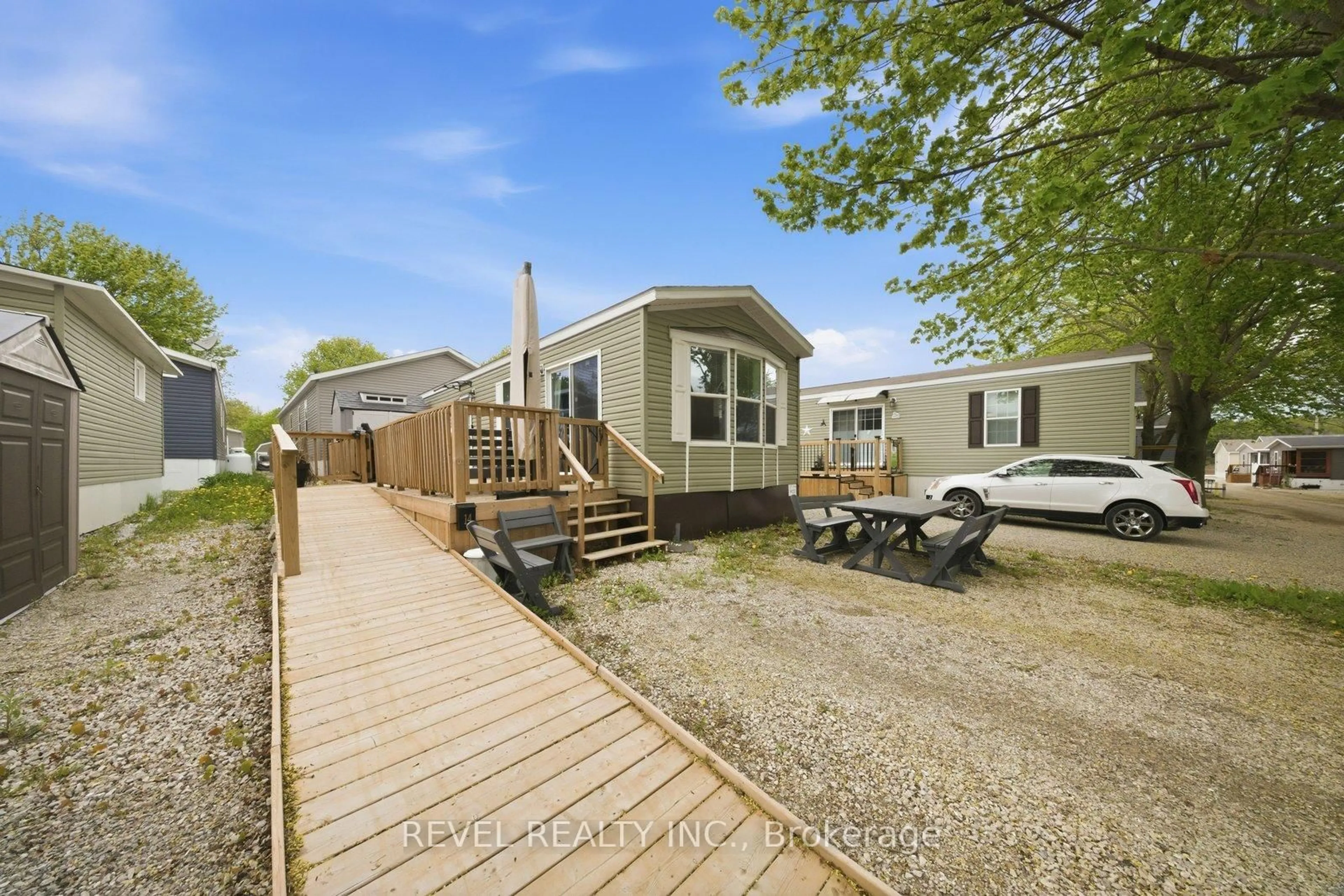 A pic from outside/outdoor area/front of a property/back of a property/a pic from drone, street for 99 Fourth Concession Rd #614, Brant Ontario N0E 1A0