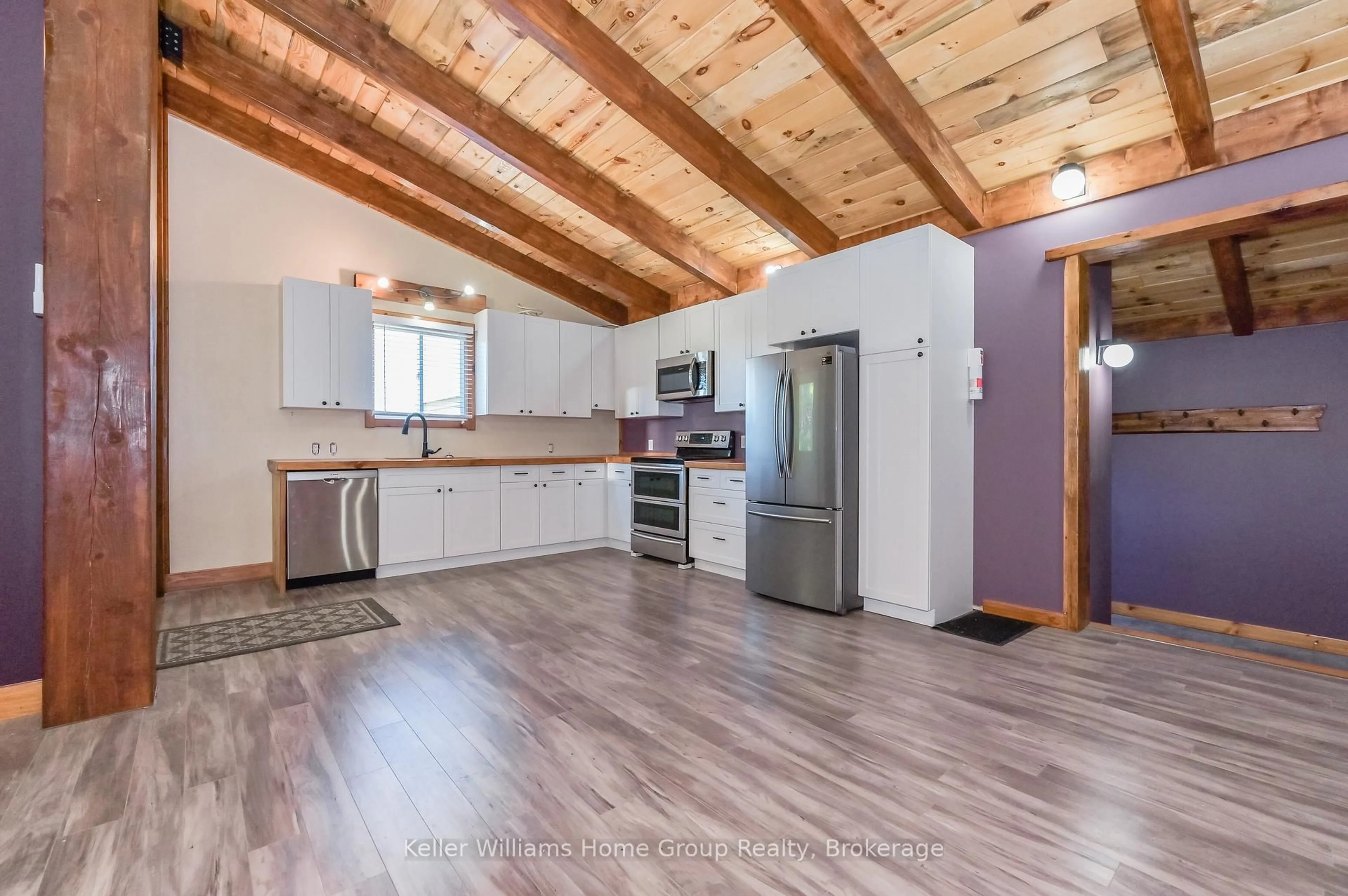 Open concept kitchen, wood/laminate floor for 56 Ann St St, Minto Ontario N0G 1M0