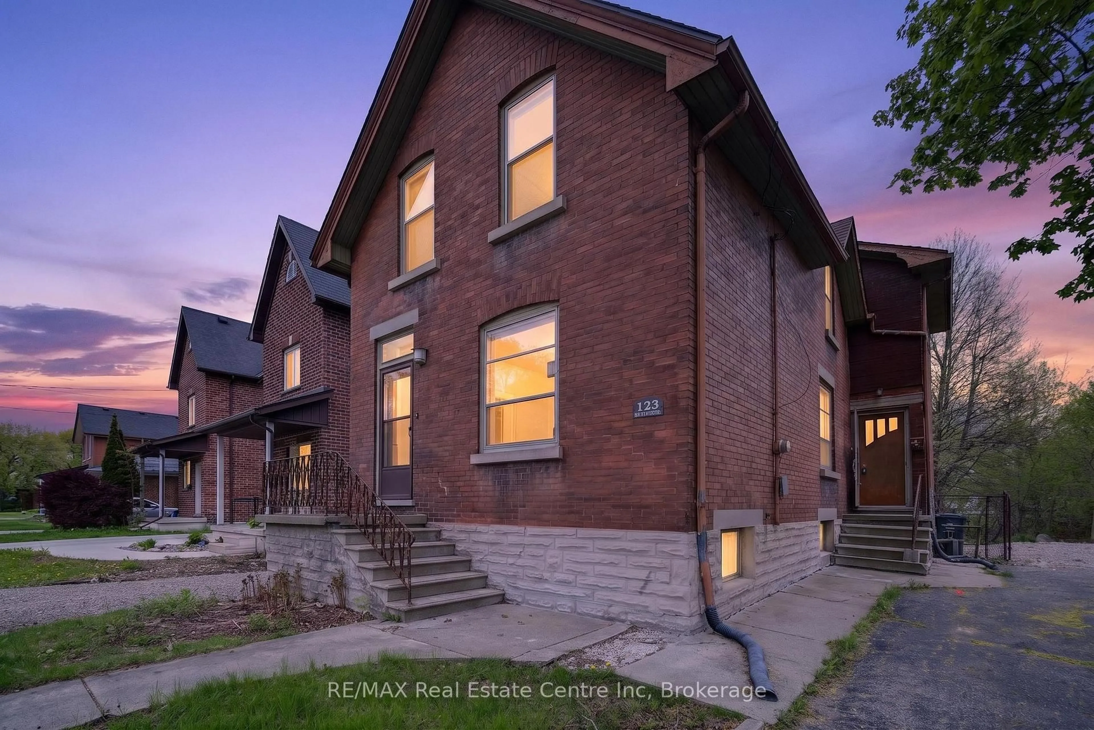 Home with brick exterior material, street for 123 Elizabeth St, Guelph Ontario N1E 2X4