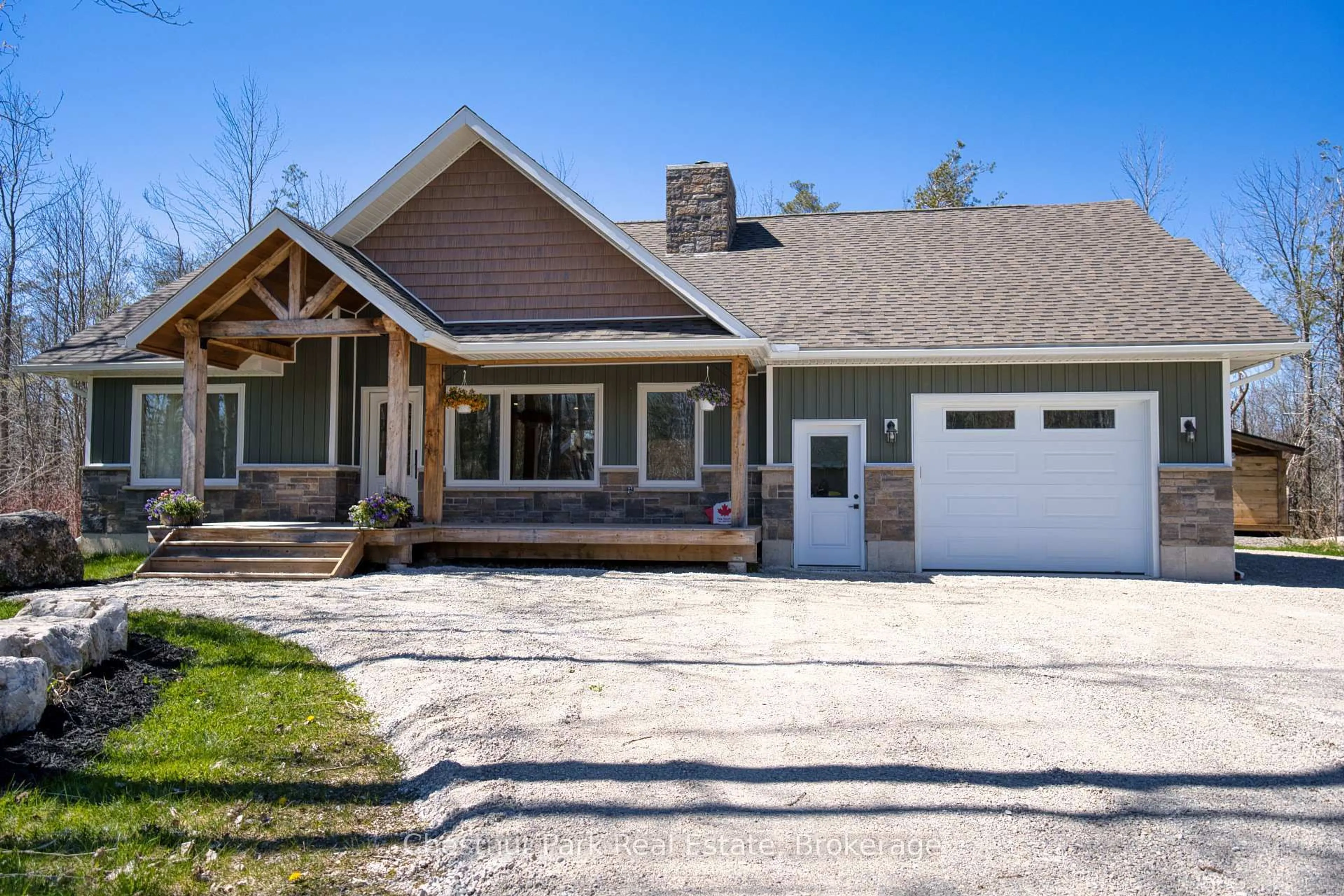 Home with vinyl exterior material, street for 23 Maple Dr, Northern Bruce Peninsula Ontario N0H 1Z0