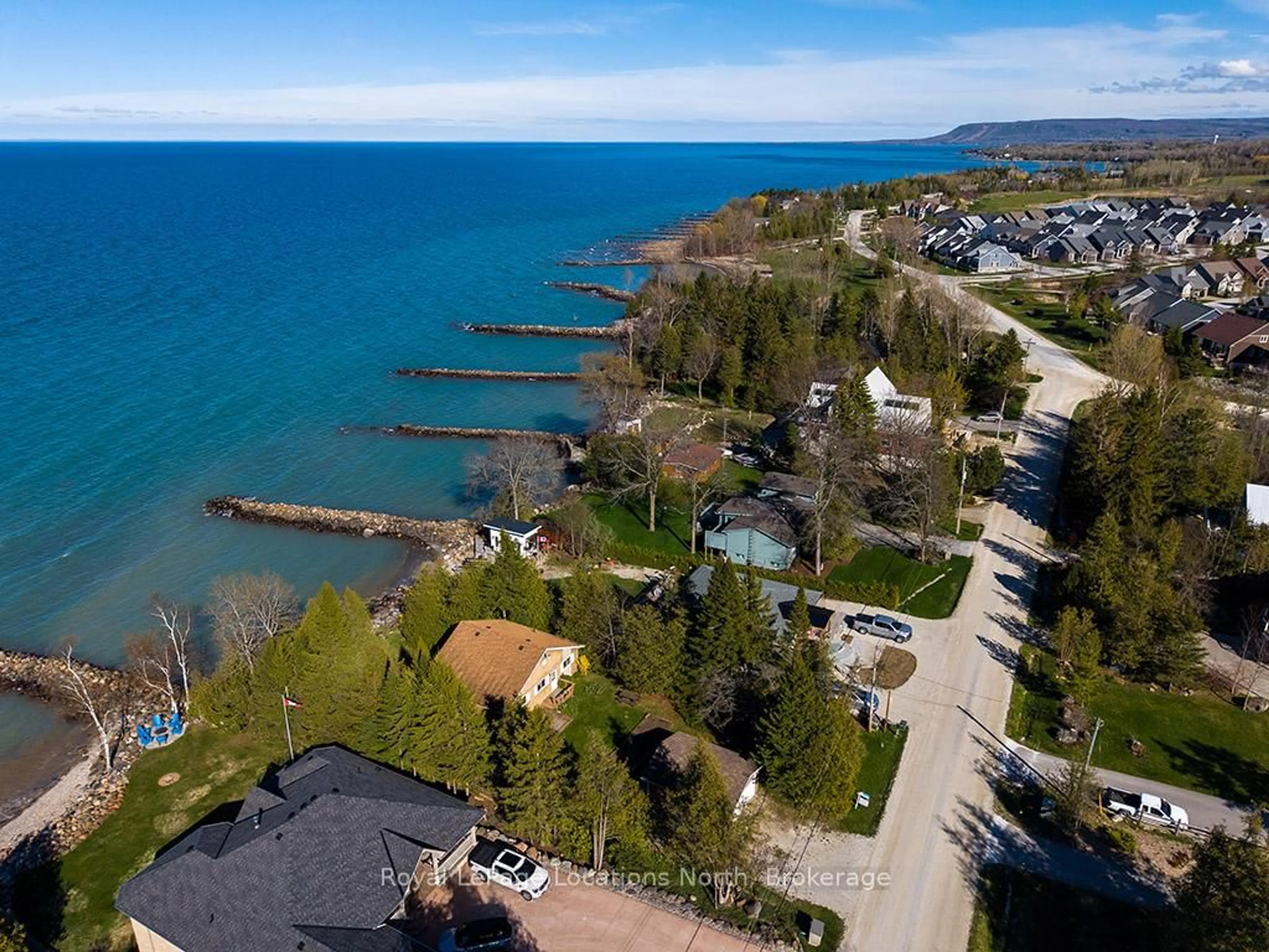 A pic from outside/outdoor area/front of a property/back of a property/a pic from drone, water/lake/river/ocean view for 227 Sunset Blvd, Blue Mountains Ontario N0H 2P0