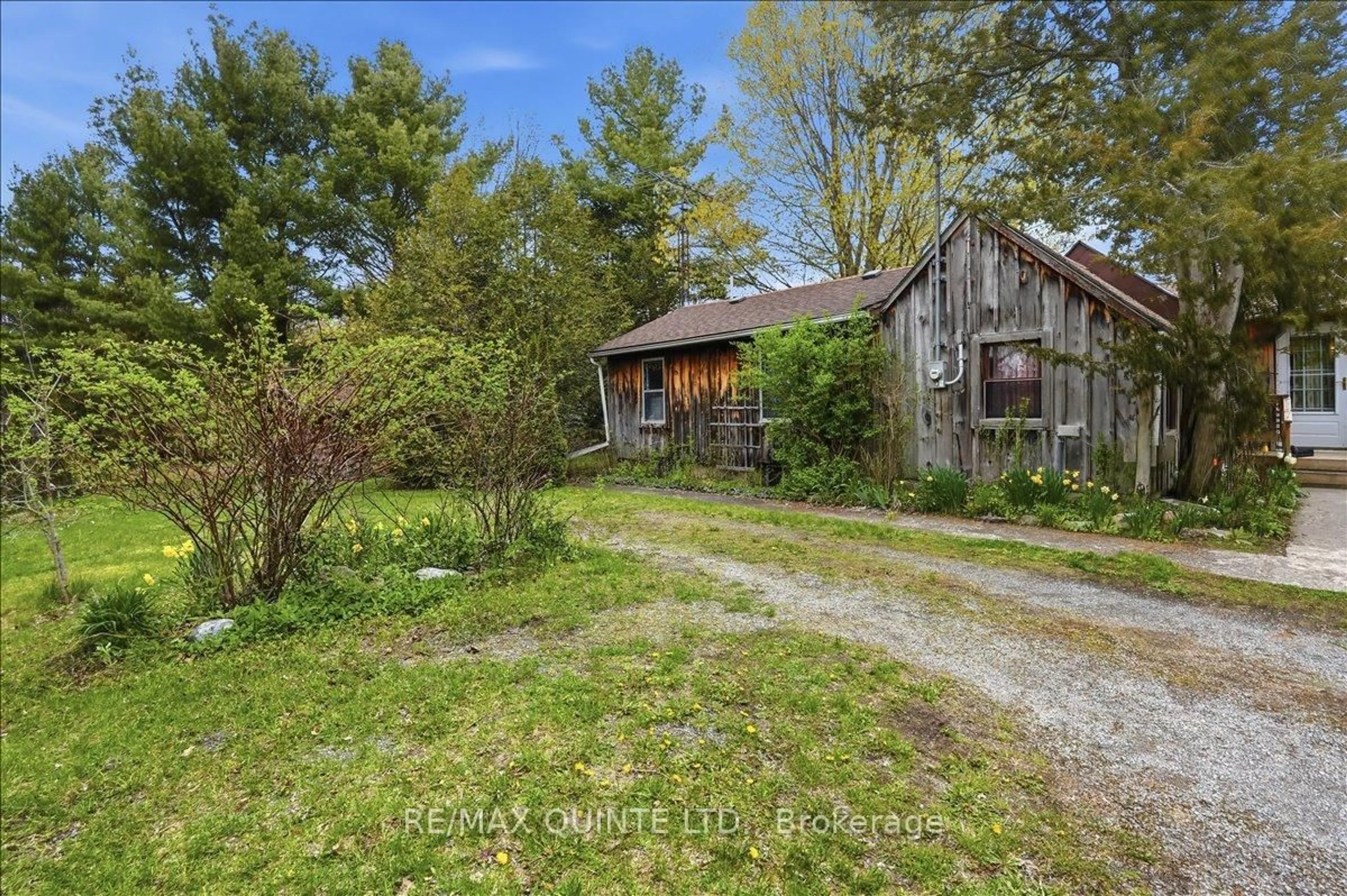 A pic from outside/outdoor area/front of a property/back of a property/a pic from drone, unknown for 1242 County Road 12, Prince Edward County Ontario K0K 2T0
