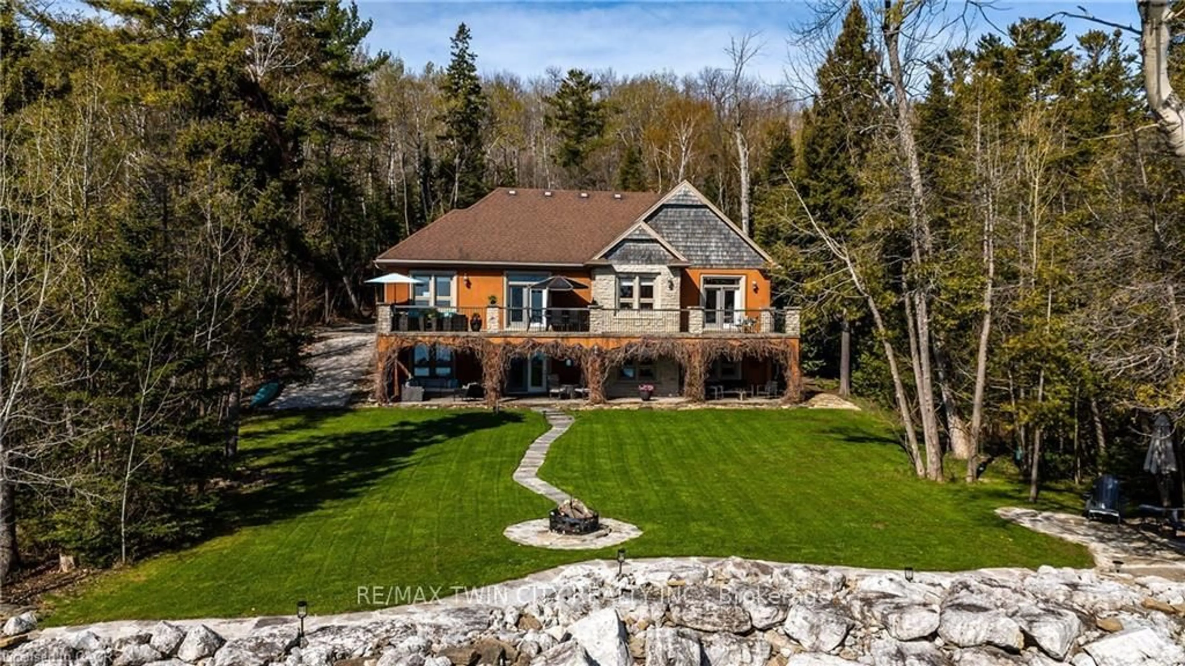 A pic from outside/outdoor area/front of a property/back of a property/a pic from drone, water/lake/river/ocean view for 504617 Grey Road 1, Georgian Bluffs Ontario N0H 2T0