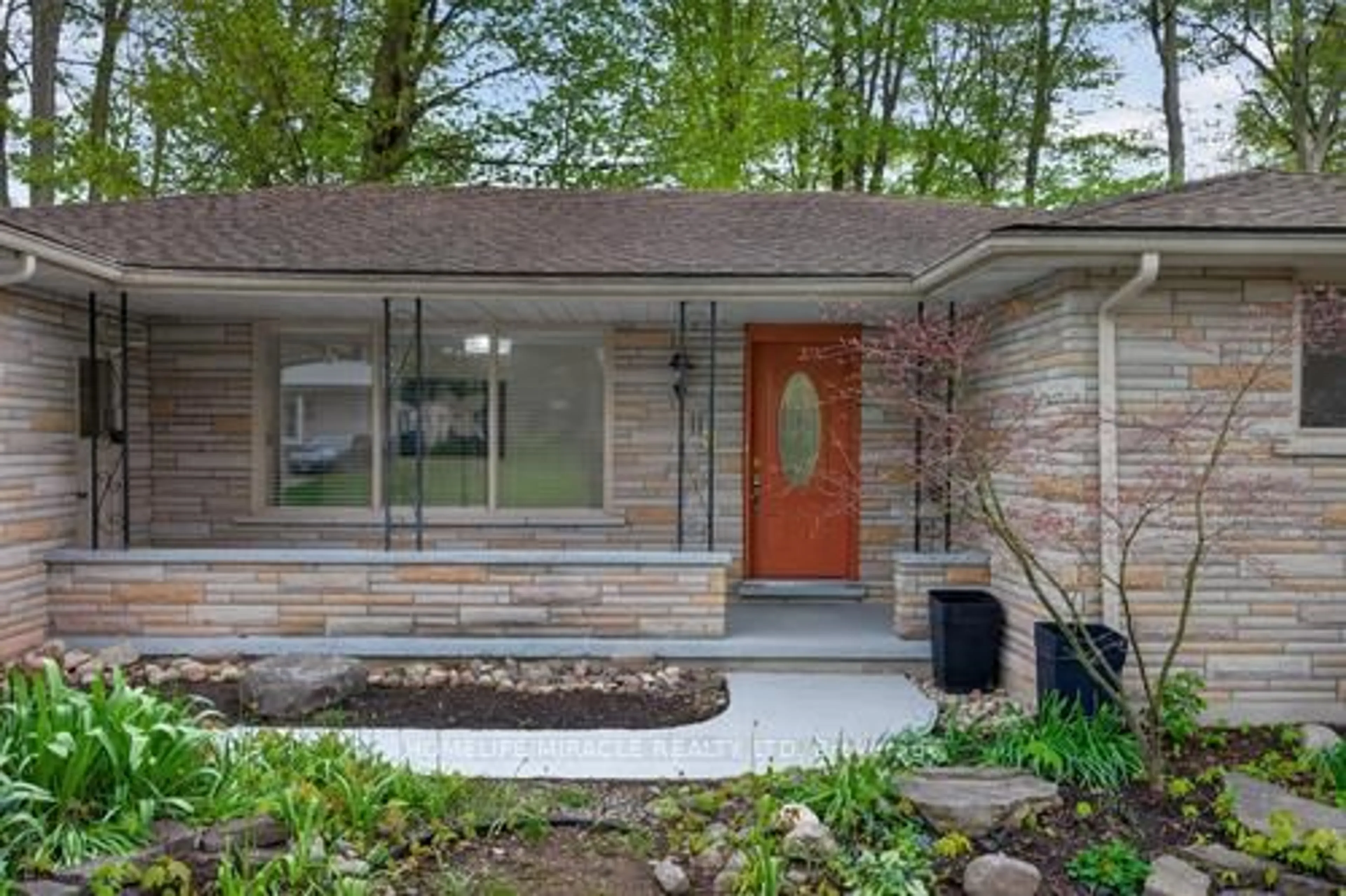 Home with brick exterior material, street for 217 Pinegrove Cres, Waterloo Ontario N2L 4V2
