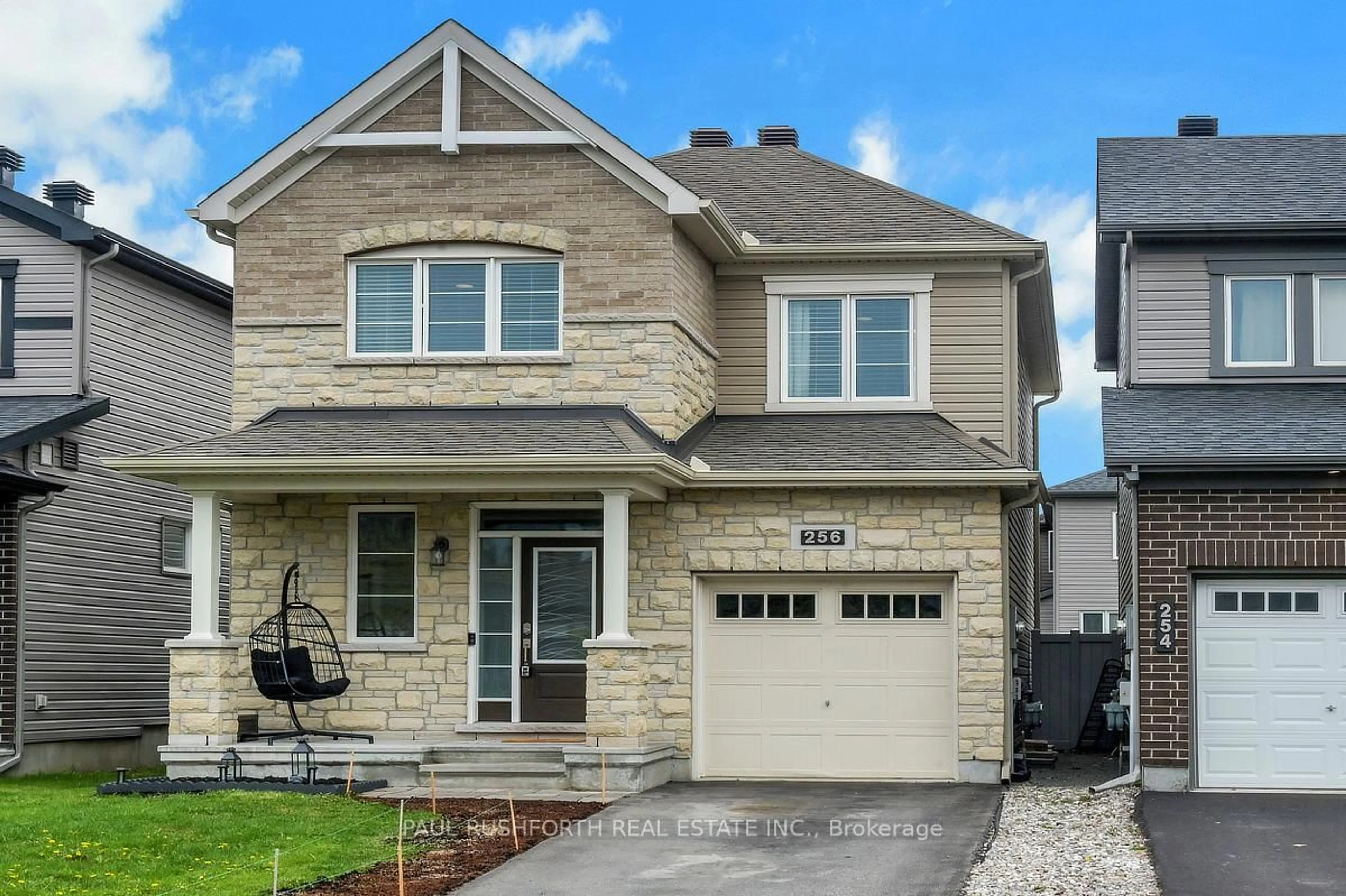 Home with vinyl exterior material, street for 256 Hepatica Way, Ottawa Ontario K4A 0Y9