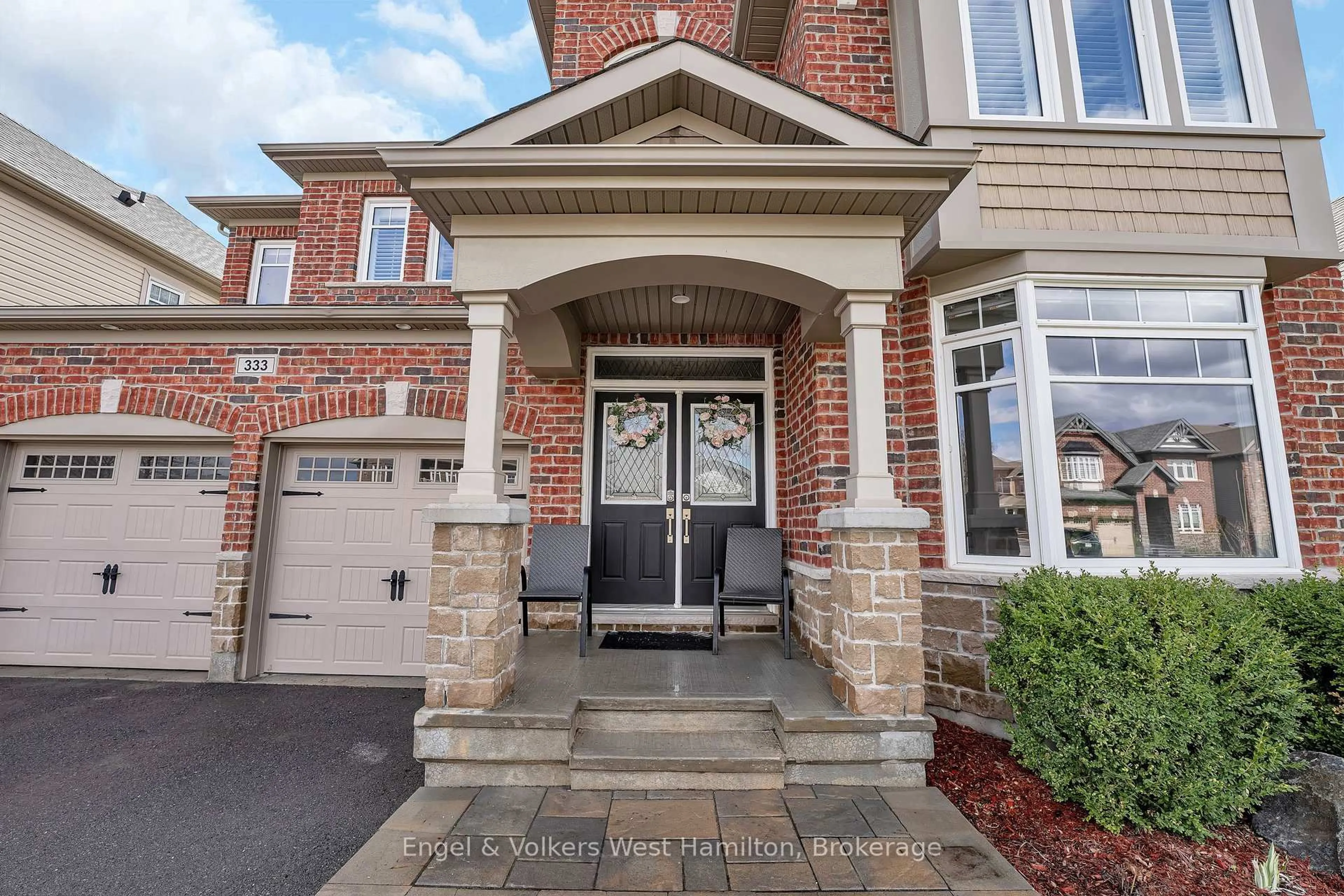 Home with brick exterior material, street for 333 Percheron Way, Stittsville Ontario K2V 0A9