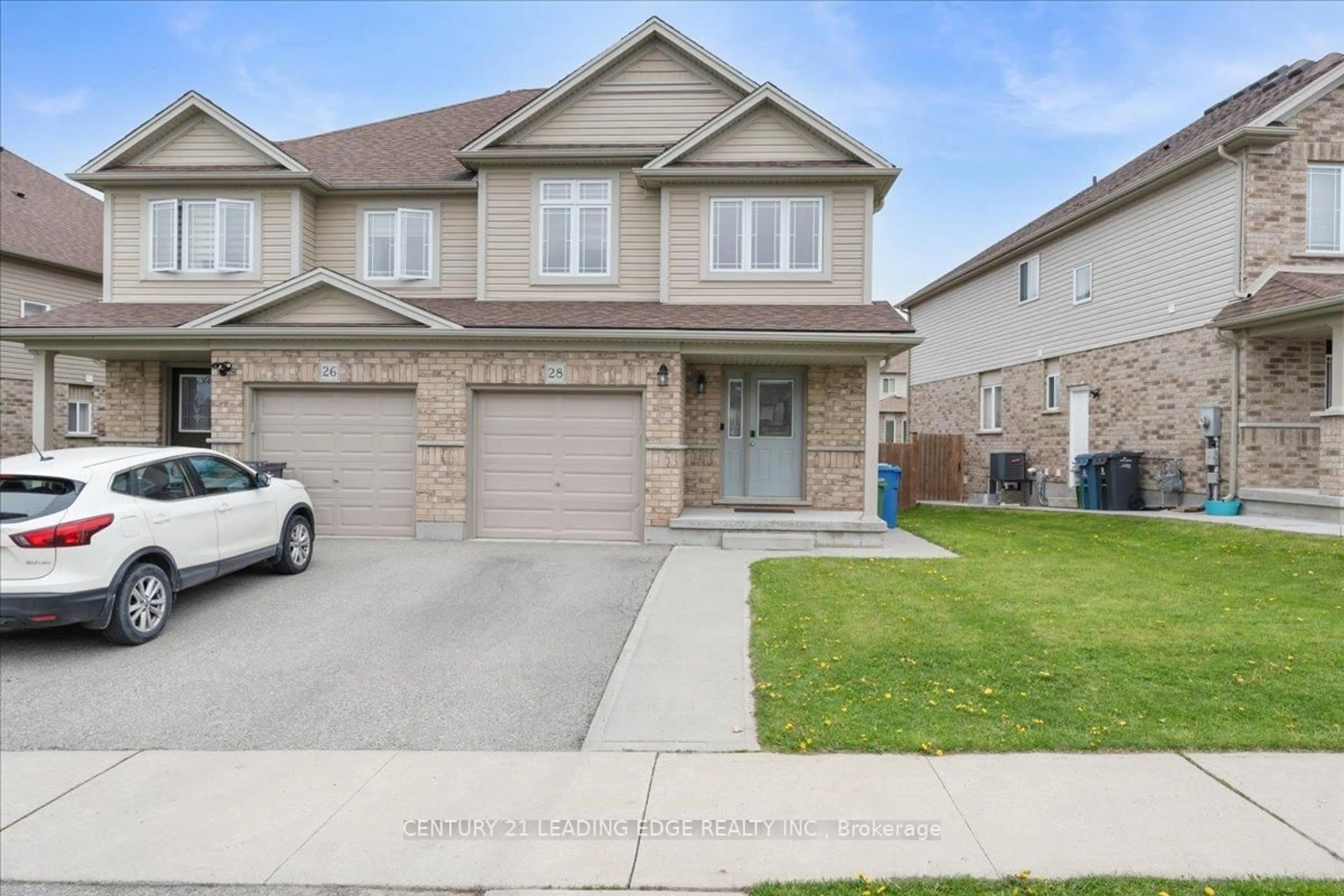 Home with brick exterior material, street for 28 Drone Cres, Guelph Ontario N1K 0C1