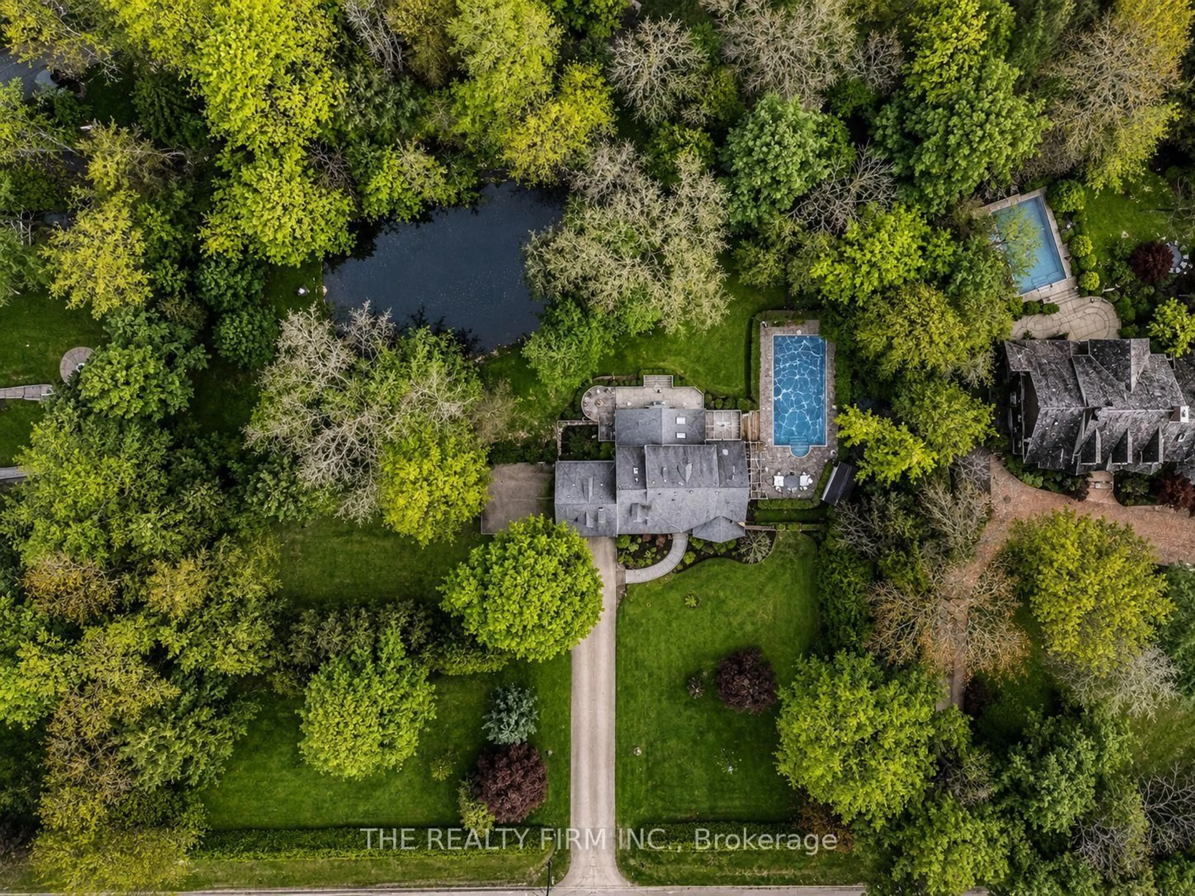 A pic from outside/outdoor area/front of a property/back of a property/a pic from drone, forest/trees view for 2294 Harris Rd, Thames Centre Ontario N0L 1G5