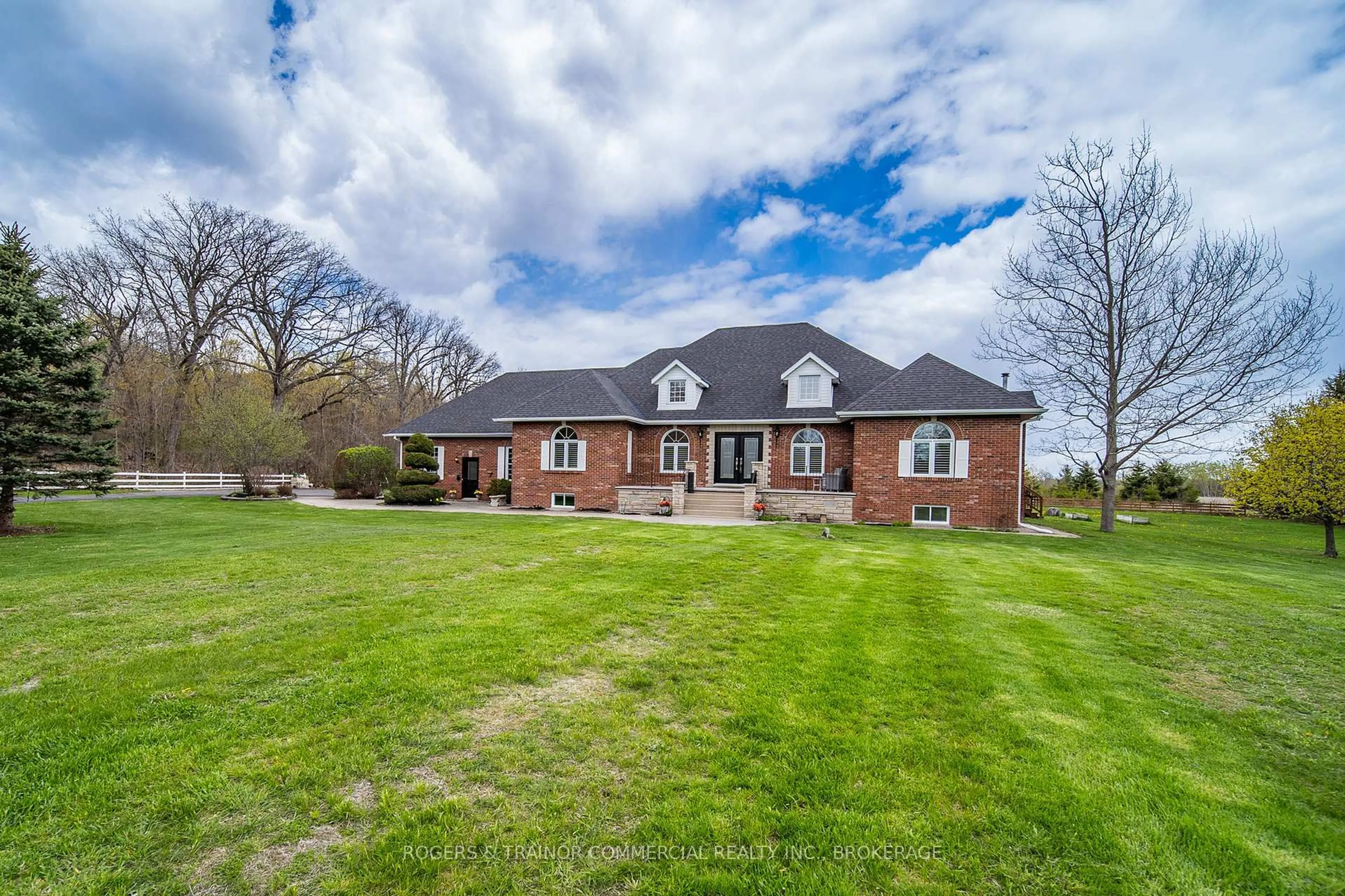 A pic from outside/outdoor area/front of a property/back of a property/a pic from drone, unknown for 697 Rogers Side Rd, Kingston Ontario K7L 4V1