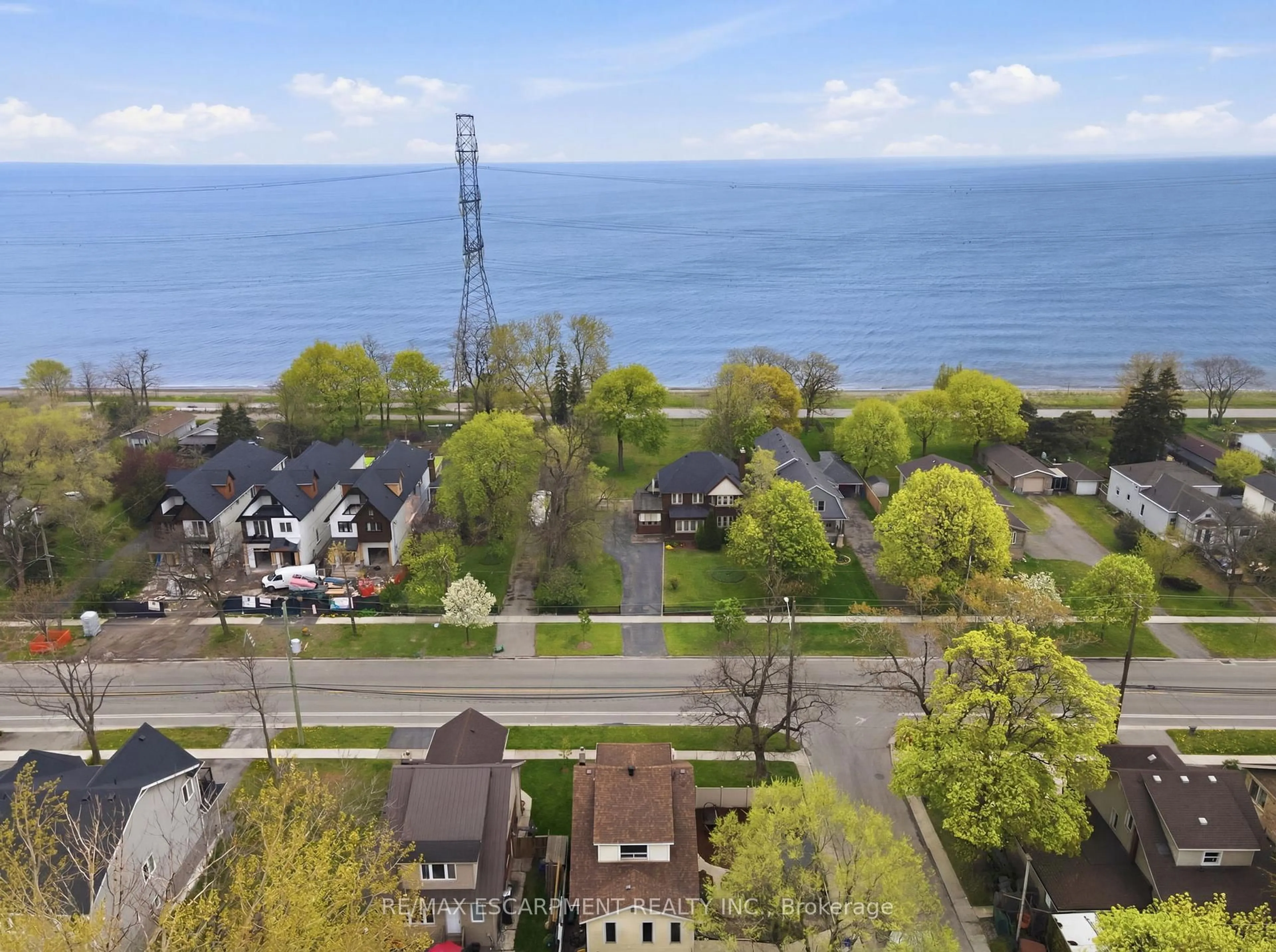 A pic from outside/outdoor area/front of a property/back of a property/a pic from drone, water/lake/river/ocean view for 230 Beach Blvd, Hamilton Ontario L8H 6W1