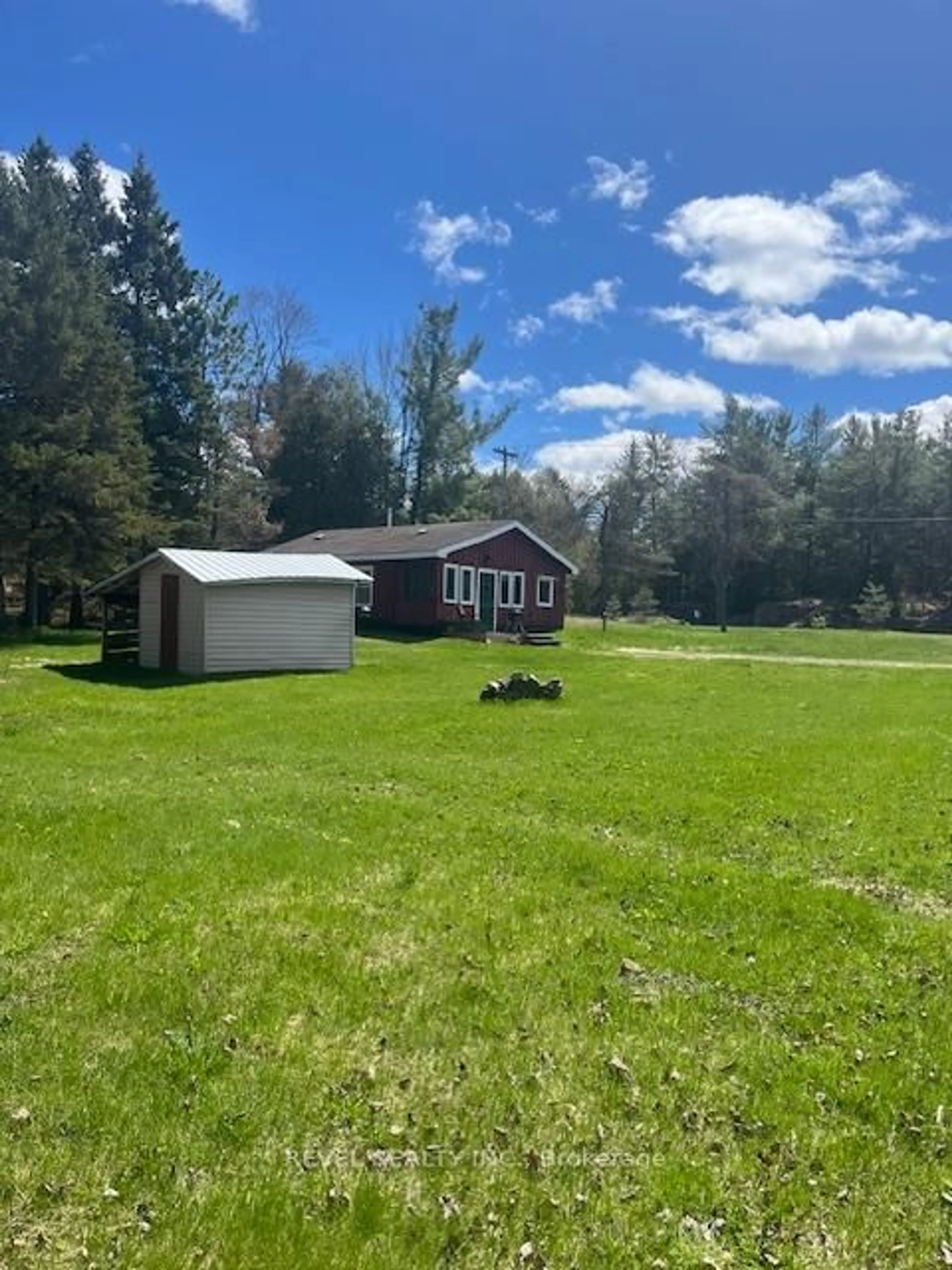 A pic from outside/outdoor area/front of a property/back of a property/a pic from drone, water/lake/river/ocean view for 4 Al's Ave, Kawartha Lakes Ontario K0M 2L0