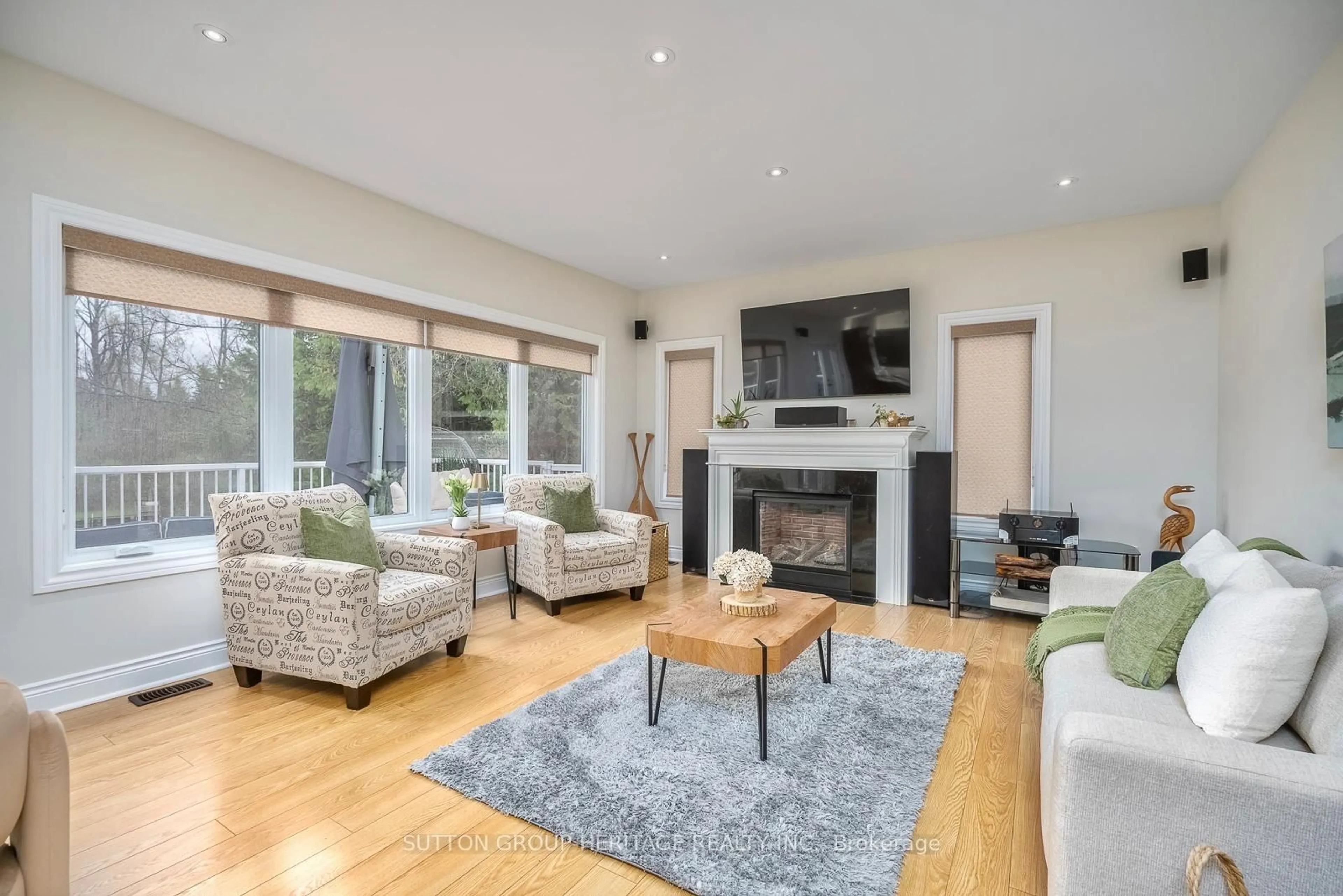 Living room with furniture, wood/laminate floor for 191 Pirates Glen Dr, Trent Lakes Ontario K0M 1A0