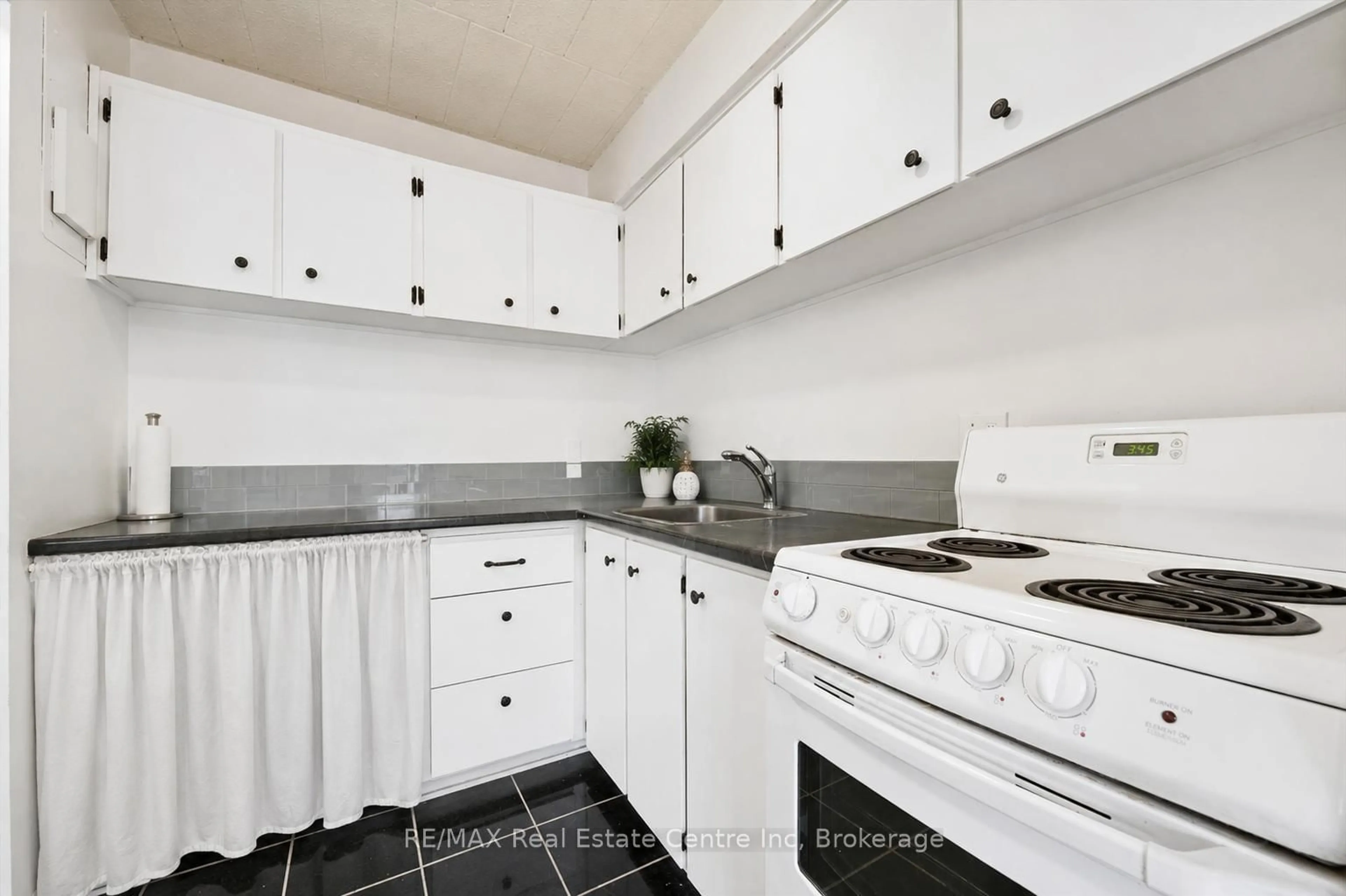 Standard kitchen, ceramic/tile floor for 91 Conroy Cres #307, Guelph Ontario N1G 2V5