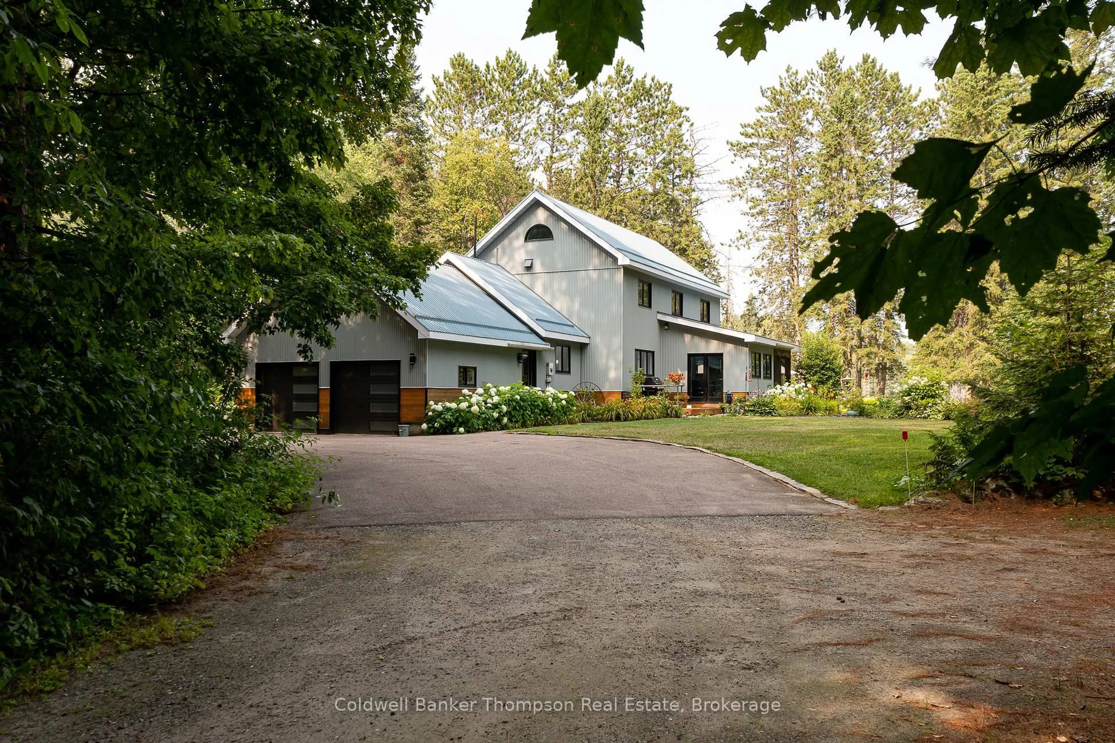 A pic from outside/outdoor area/front of a property/back of a property/a pic from drone, street for 1095 Williamsport Rd, Huntsville Ontario P1H 2J4