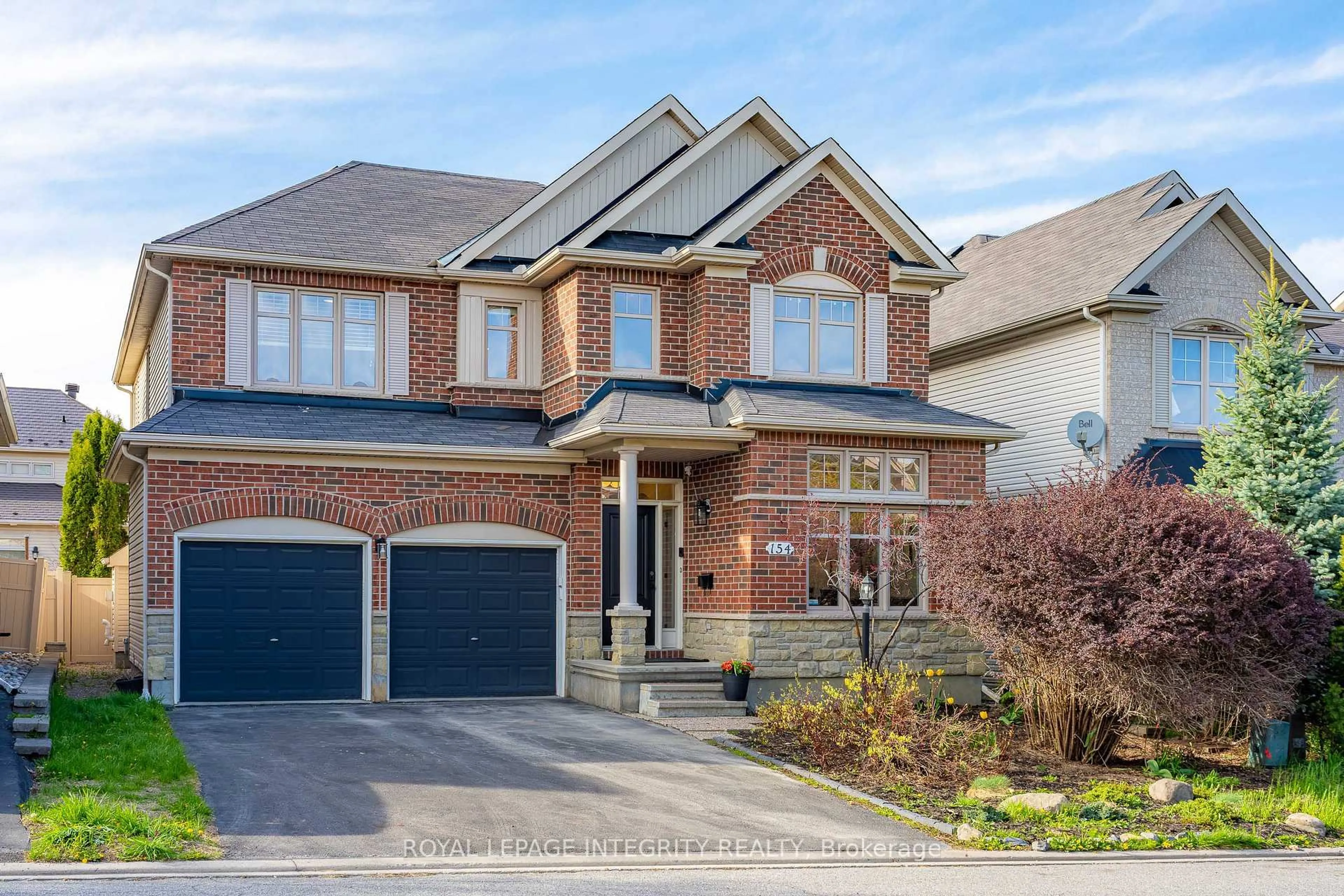 Home with brick exterior material, street for 154 Rodeo Dr, Ottawa Ontario K2J 5K7